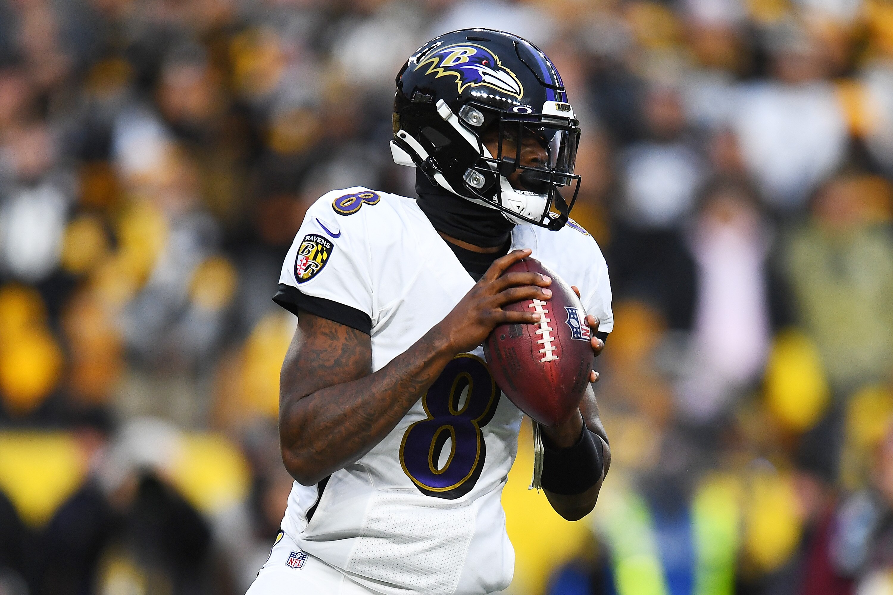 PITTSBURGH, PENNSYLVANIA - DECEMBER 05: Lamar Jackson #8 of the Baltimore Ravens looks to pass against the Pittsburgh Steelers during the \1q at Heinz Field on December 05, 2021 in Pittsburgh, Pennsylvania. (Photo by Joe Sargent/Getty Images)