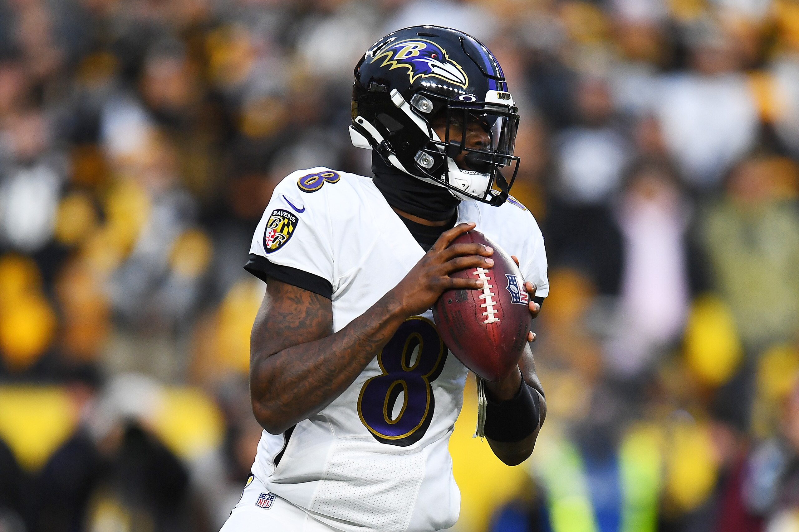 PITTSBURGH, PENNSYLVANIA - DECEMBER 05: Lamar Jackson #8 of the Baltimore Ravens looks to pass against the Pittsburgh Steelers during the \1q at Heinz Field on December 05, 2021 in Pittsburgh, Pennsylvania. (Photo by Joe Sargent/Getty Images)