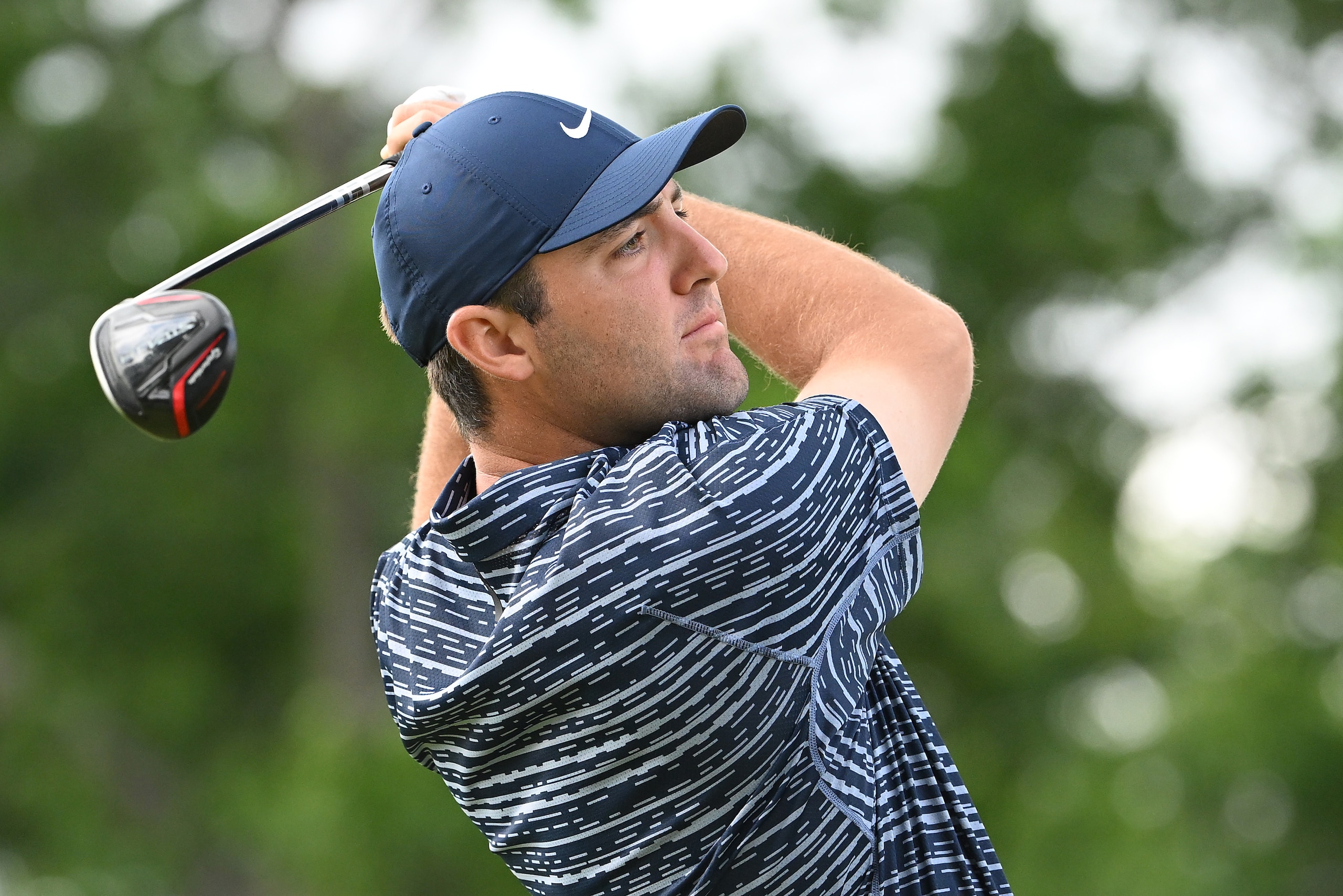 BROOKLINE, MASSACHUSETTS - JUNE 15: Scottie Scheffler of the United States plays his shot from the 10th tee during a practice round prior to the US Open at The Country Club on June 15, 2022 in Brookline, Massachusetts. (Photo by Ross Kinnaird/Getty Images)