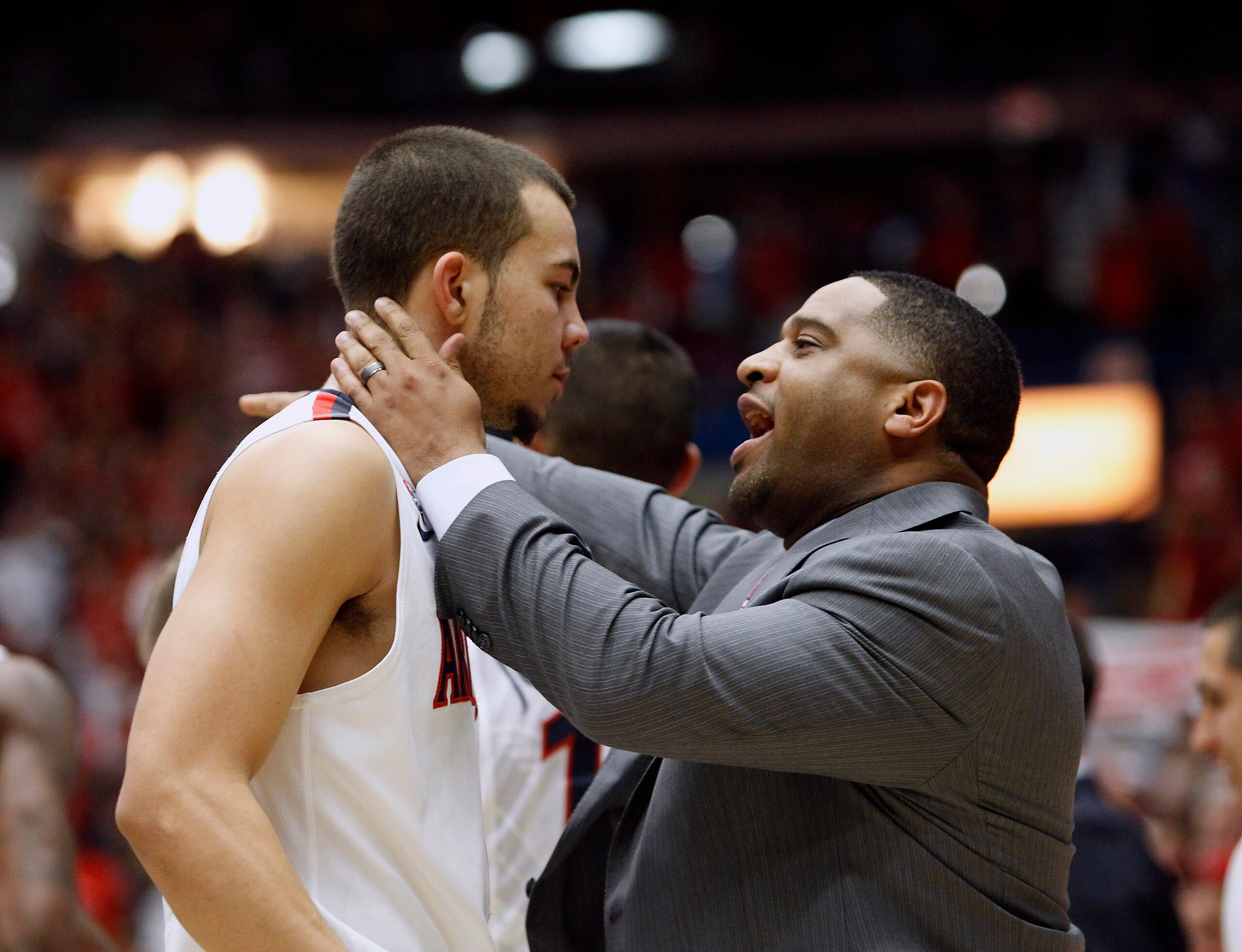 TUCSON, AZ - FEBRUARY 06:  Assistant coach Book Richardson of the Arizona Wildcats talks to guard Gabe York #1 of the Wildcats during a time-out of a college basketball game against the Oregon Ducks at McKale Center on February 6, 2014 in Tucson, Arizona.  (Photo by Ralph Freso/Getty Images)