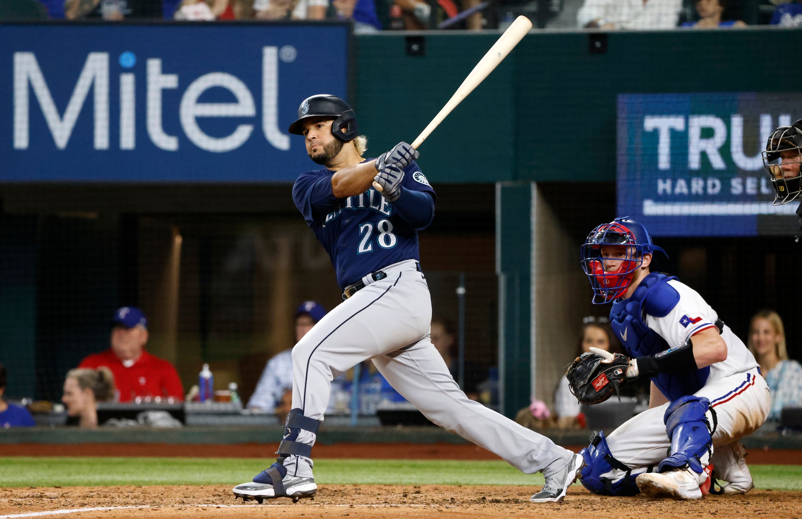 ARLINGTON, TX - JUNE 4: Eugenio Suarez #28 of the Seattle Mariners singles against the Texas Rangers during the eighth inning at Globe Life Field on June 4, 2022 in Arlington, Texas. The Rangers won 3-2. (Photo by Ron Jenkins/Getty Images)