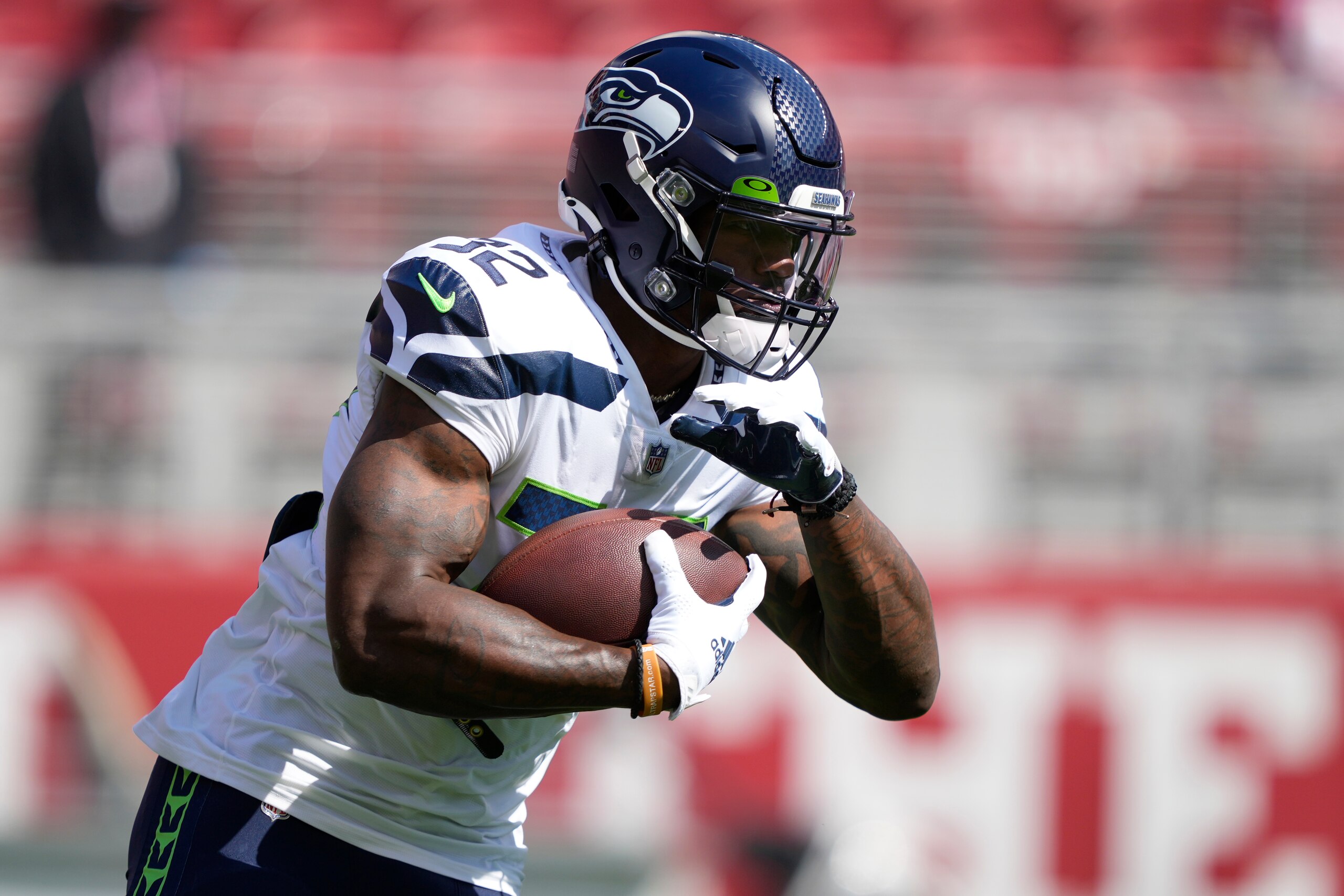 Seattle Seahawks running back Chris Carson warms up before an NFL football game against the San Francisco 49ers in Santa Clara, Calif., Sunday, Oct. 3, 2021. (AP Photo/Tony Avelar) Seattle Seahawks running back Chris Carson warms up before an NFL football game against the San Francisco 49ers in Santa Clara, Calif., Sunday, Oct. 3, 2021. (AP Photo/Tony Avelar)