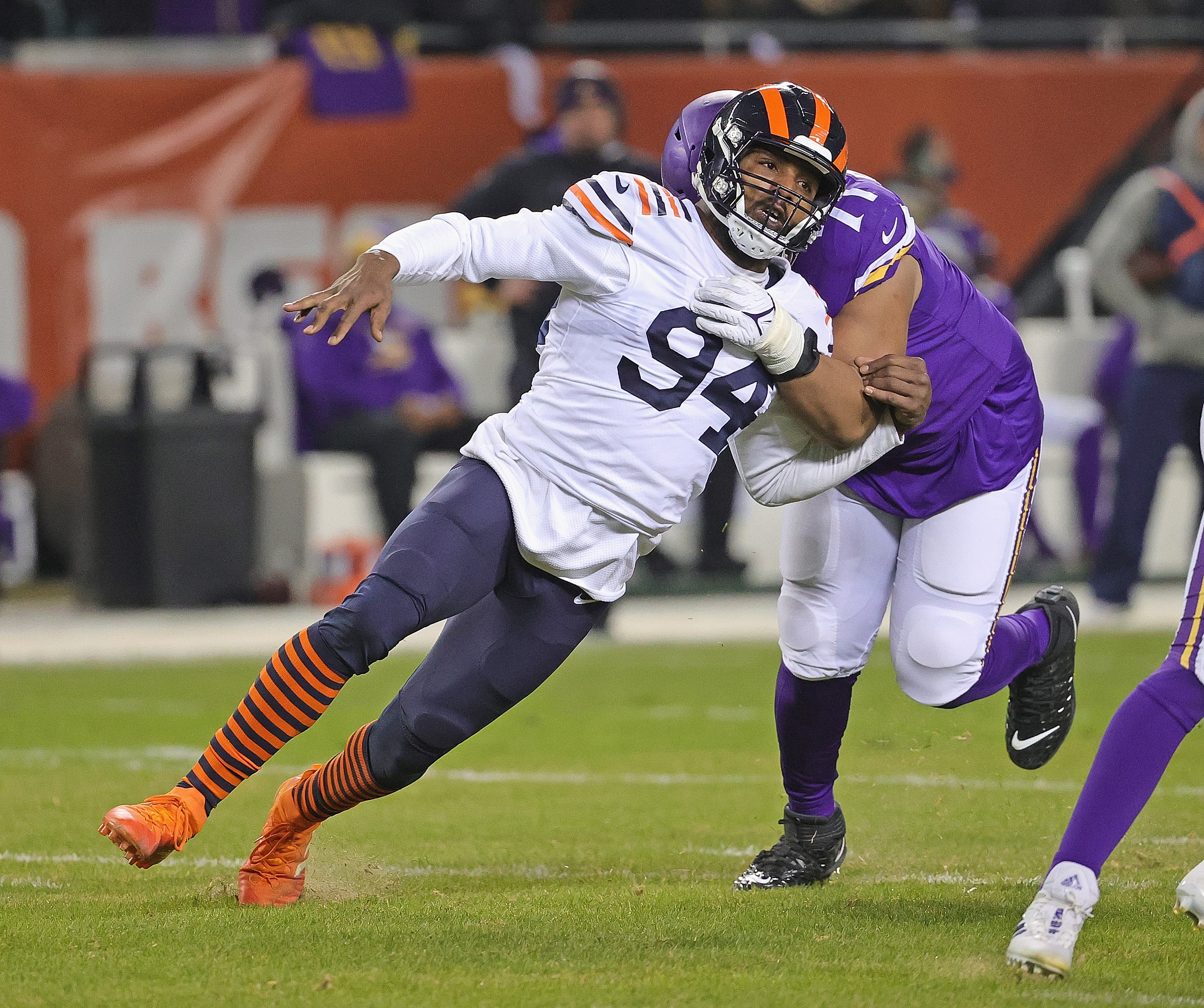CHICAGO, ILLINOIS - DECEMBER 20: Robert Quinn #94 of the Chicago Bears rushes against Christian Darrisaw #71 of the Minnesota Vikings at Soldier Field on December 20, 2021 in Chicago, Illinois. The Vikings defeated the Bears 17-9. (Photo by Jonathan Daniel/Getty Images)
