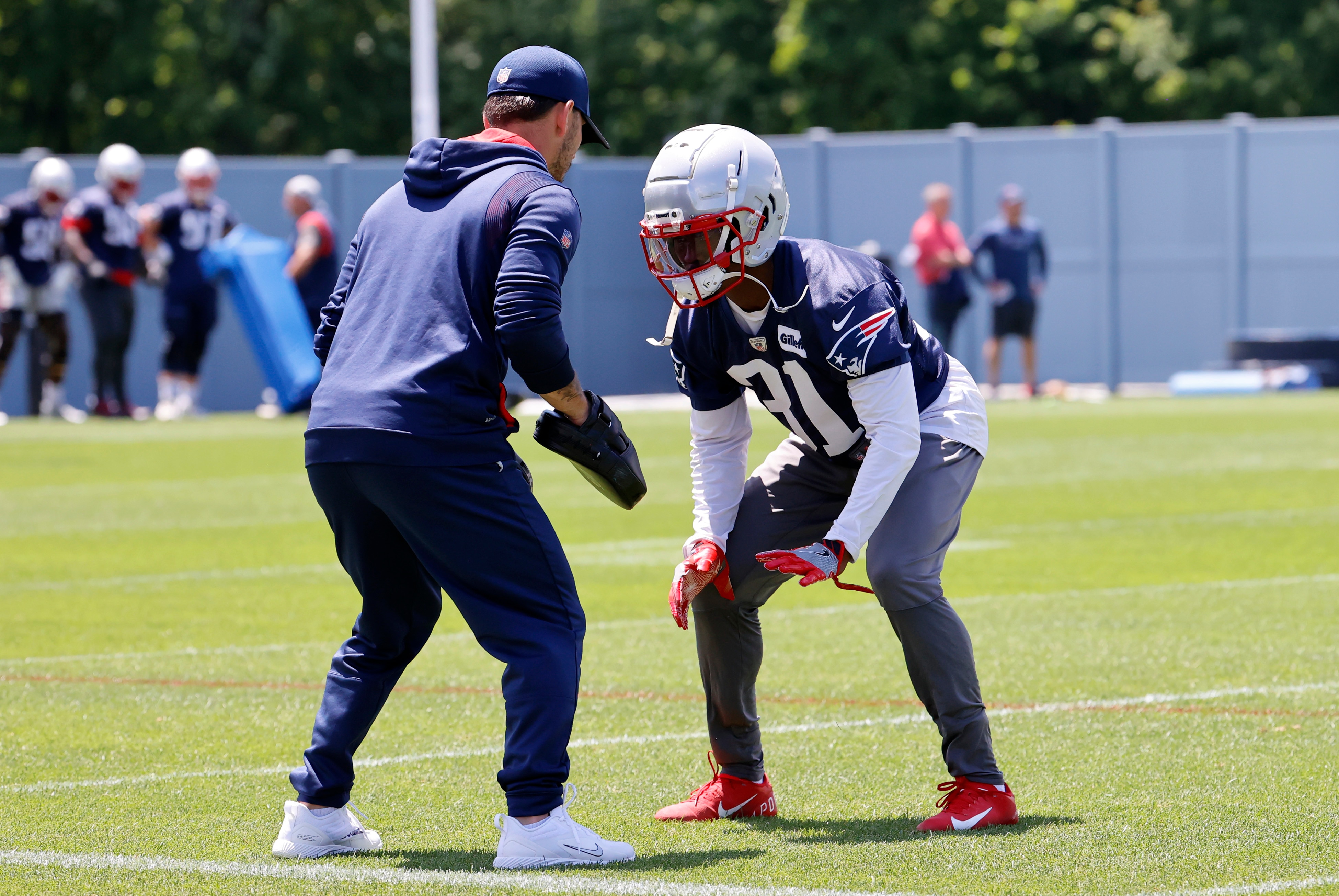 FOXBOROUGH, MA - JUNE 08: New England Patriots defensive back Jonathan Jones (31) works on a line drill during Day 2 of mandatory New England Patriots minicamp on June 8, 2022, at the Patriots Training Facility at Gillette Stadium in Foxborough, Massachusetts. (Photo by Fred Kfoury III/Icon Sportswire via Getty Images)