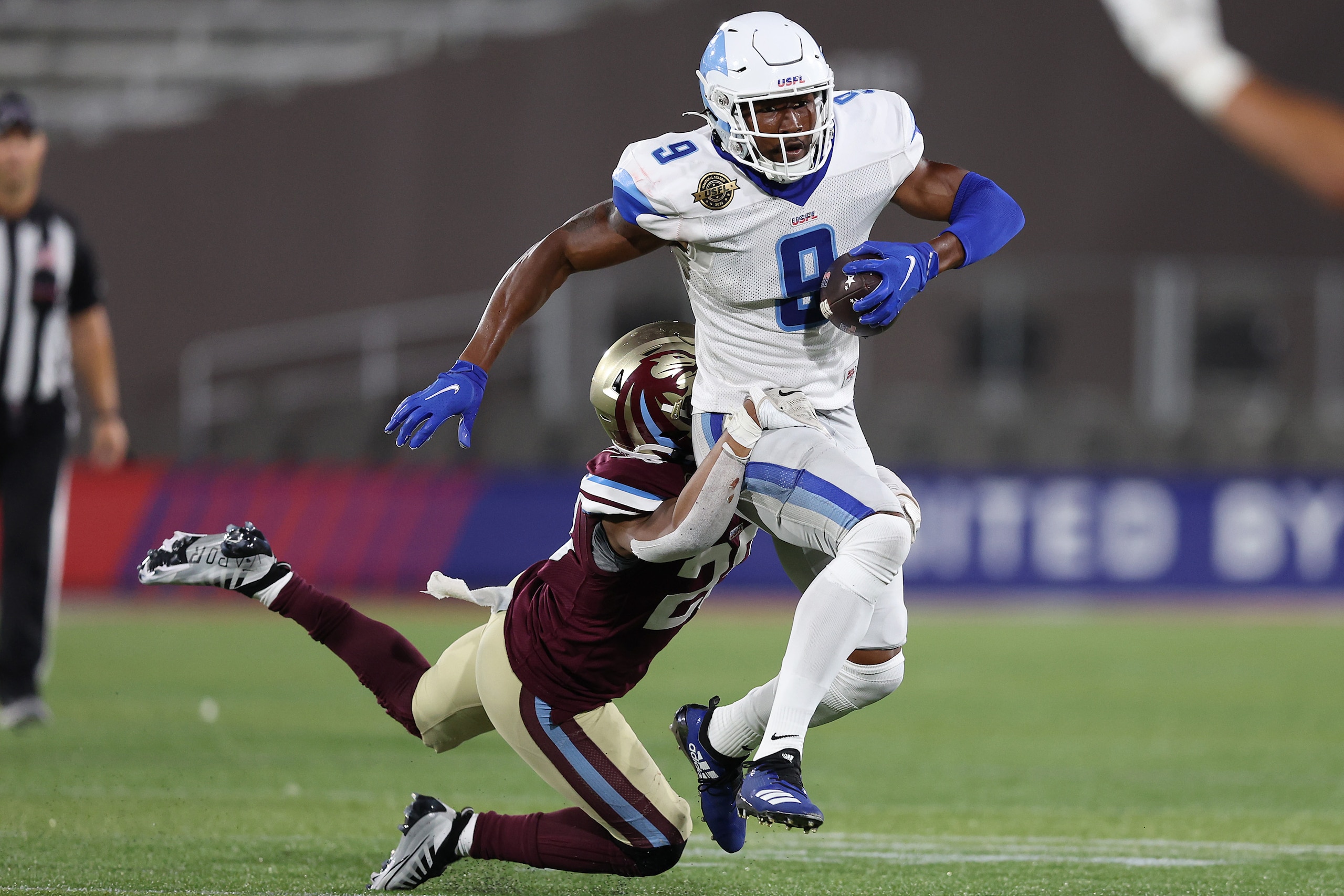 BIRMINGHAM, ALABAMA - MAY 28: Jonathan Adams #9 of the New Orleans Breakers is tackled by Jalin Burrell #23 of the Michigan Panthers in the fourth quarter of the game at Protective Stadium on May 28, 2022 in Birmingham, Alabama. (Photo by Patrick Smith/USFL/Getty Images) BIRMINGHAM, ALABAMA - MAY 28: Jonathan Adams #9 of the New Orleans Breakers is tackled by Jalin Burrell #23 of the Michigan Panthers in the fourth quarter of the game at Protective Stadium on May 28, 2022 in Birmingham, Alabama. (Photo by Patrick Smith/USFL/Getty Images)