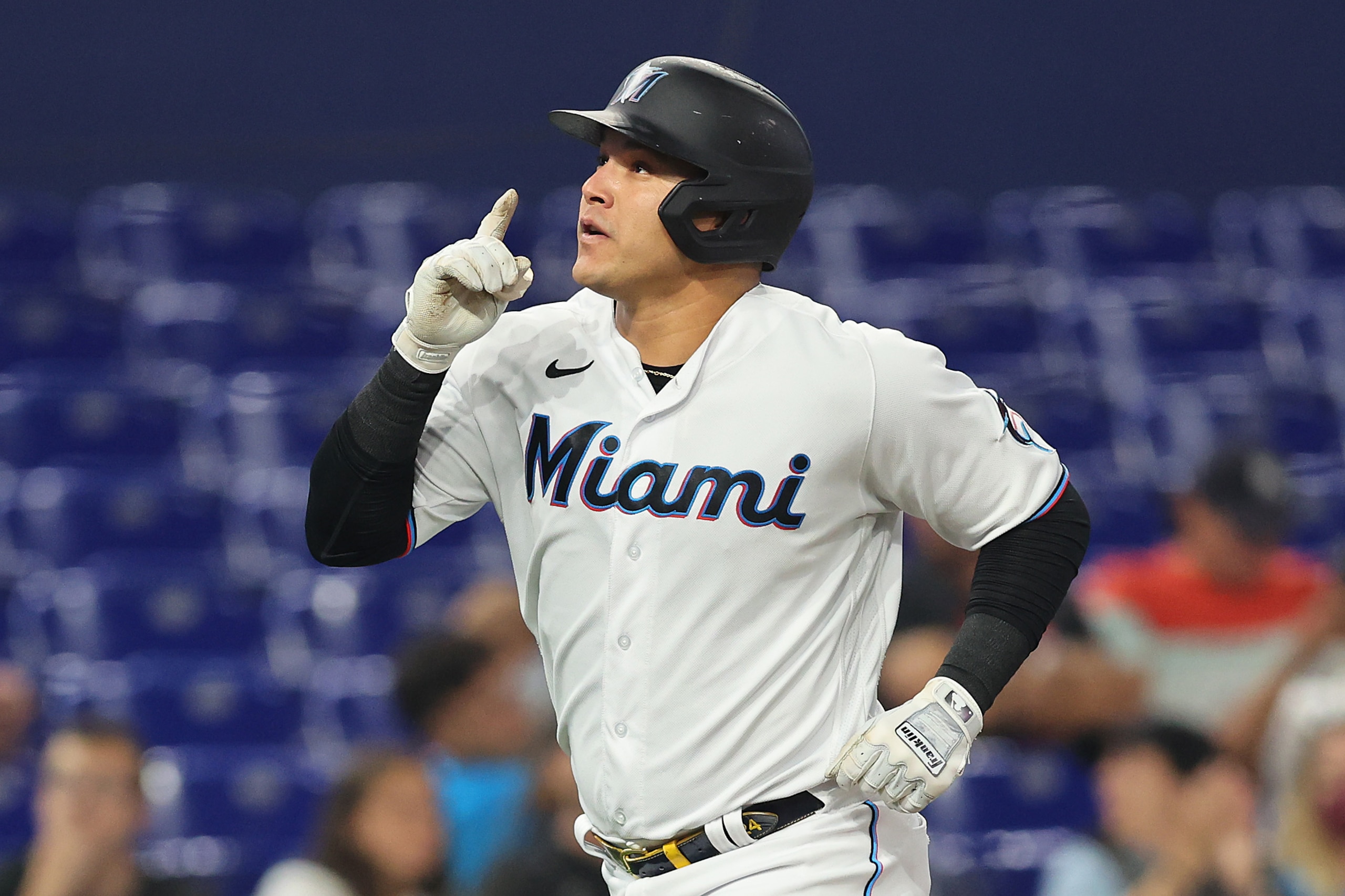 MIAMI, FLORIDA - MAY 16: Avisail Garcia #24 of the Miami Marlins rounds the bases after hitting a solo home run during the second inning against the Washington Nationals at loanDepot park on May 16, 2022 in Miami, Florida. (Photo by Michael Reaves/Getty Images)