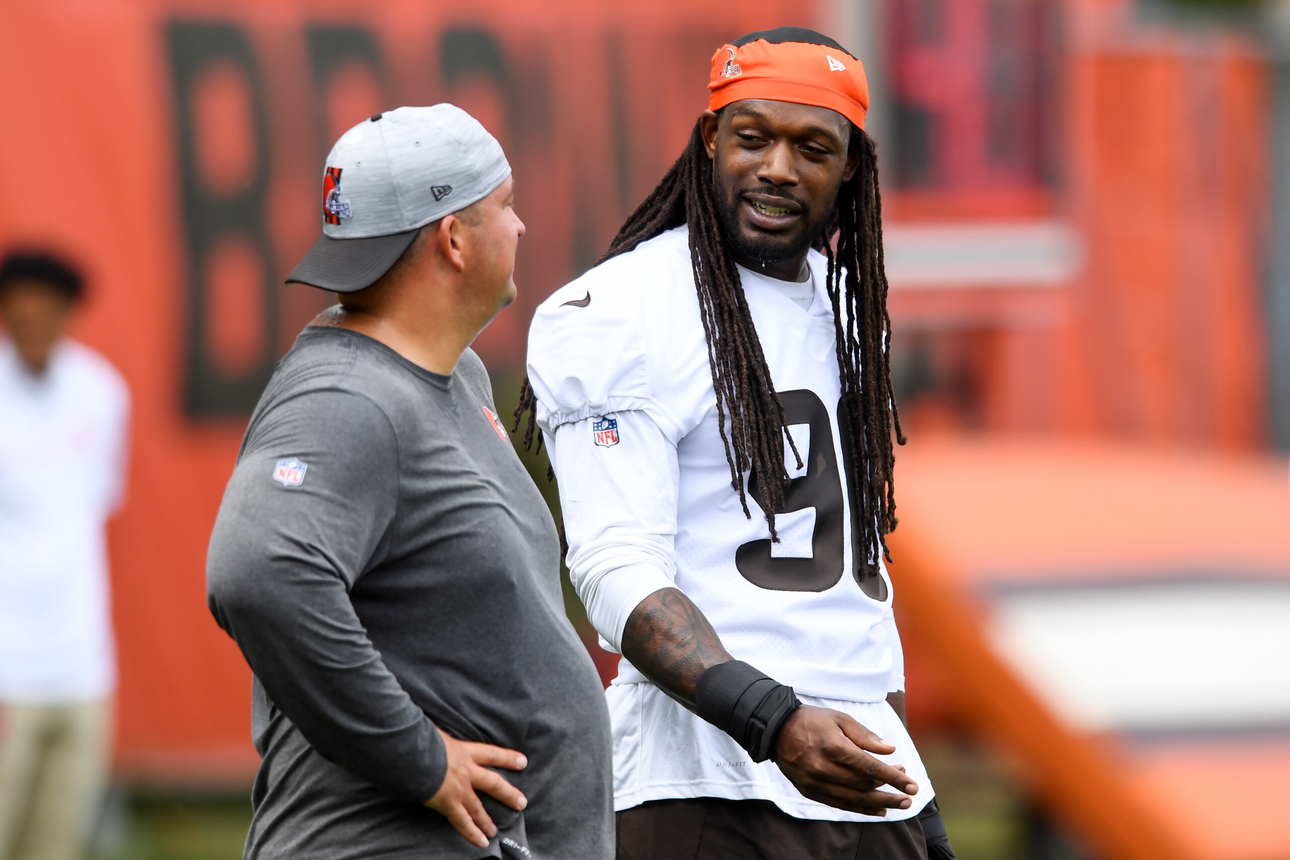 BEREA, OH - MAY 25: Jadeveon Clowney #90 of the Cleveland Browns talks with defensive line coach Chris Kiffin during the Cleveland Browns OTAs at CrossCountry Mortgage Campus on May 25, 2022 in Berea, Ohio. (Photo by Nick Cammett/Diamond Images via Getty Images)