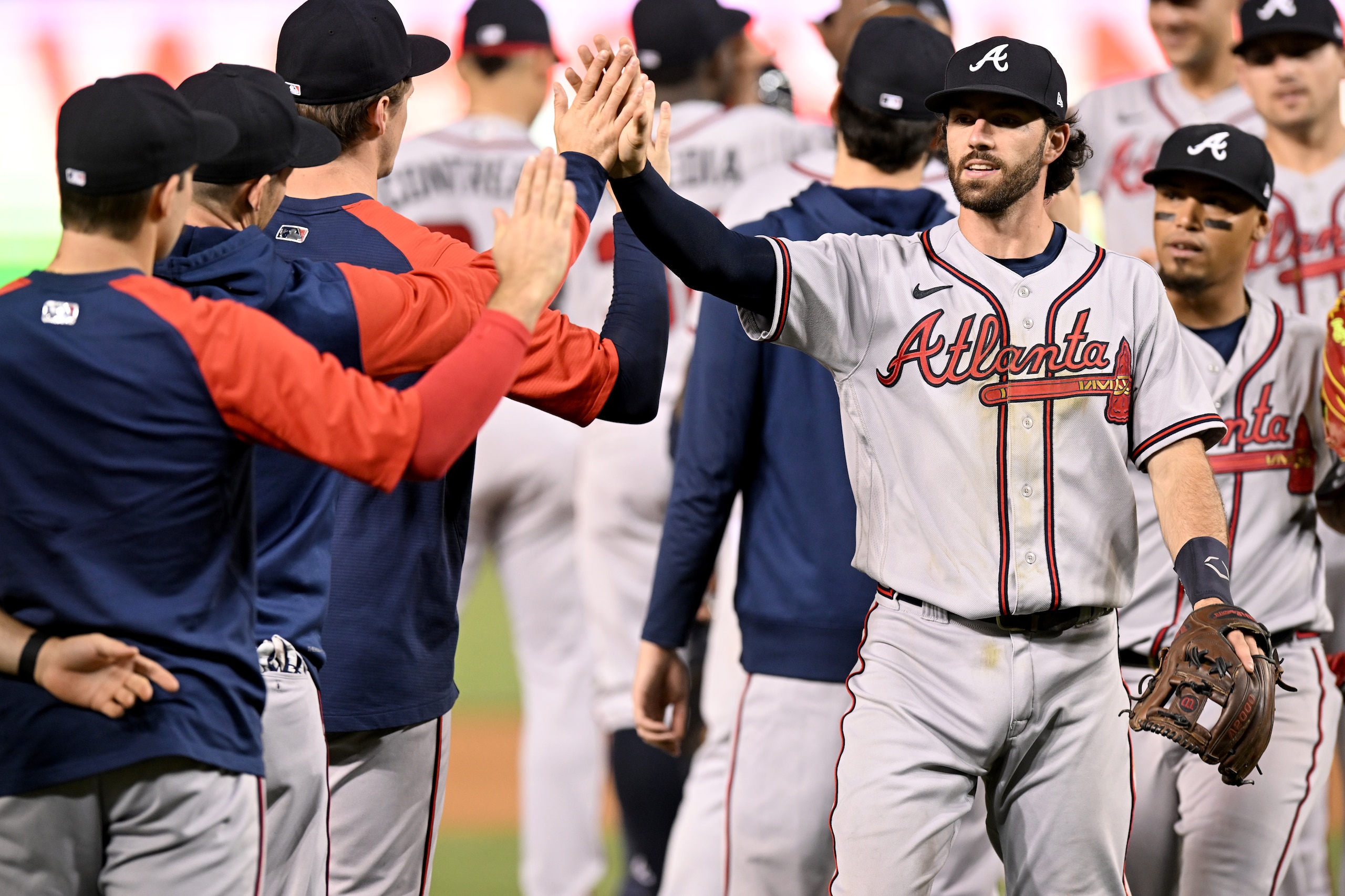 WASHINGTON, DC - JUNE 14: Dansby Swanson #7 of the Atlanta Braves celebrates with teammates after a 10-4 victory against the Washington Nationals at Nationals Park on June 14, 2022 in Washington, DC. (Photo by Greg Fiume/Getty Images)