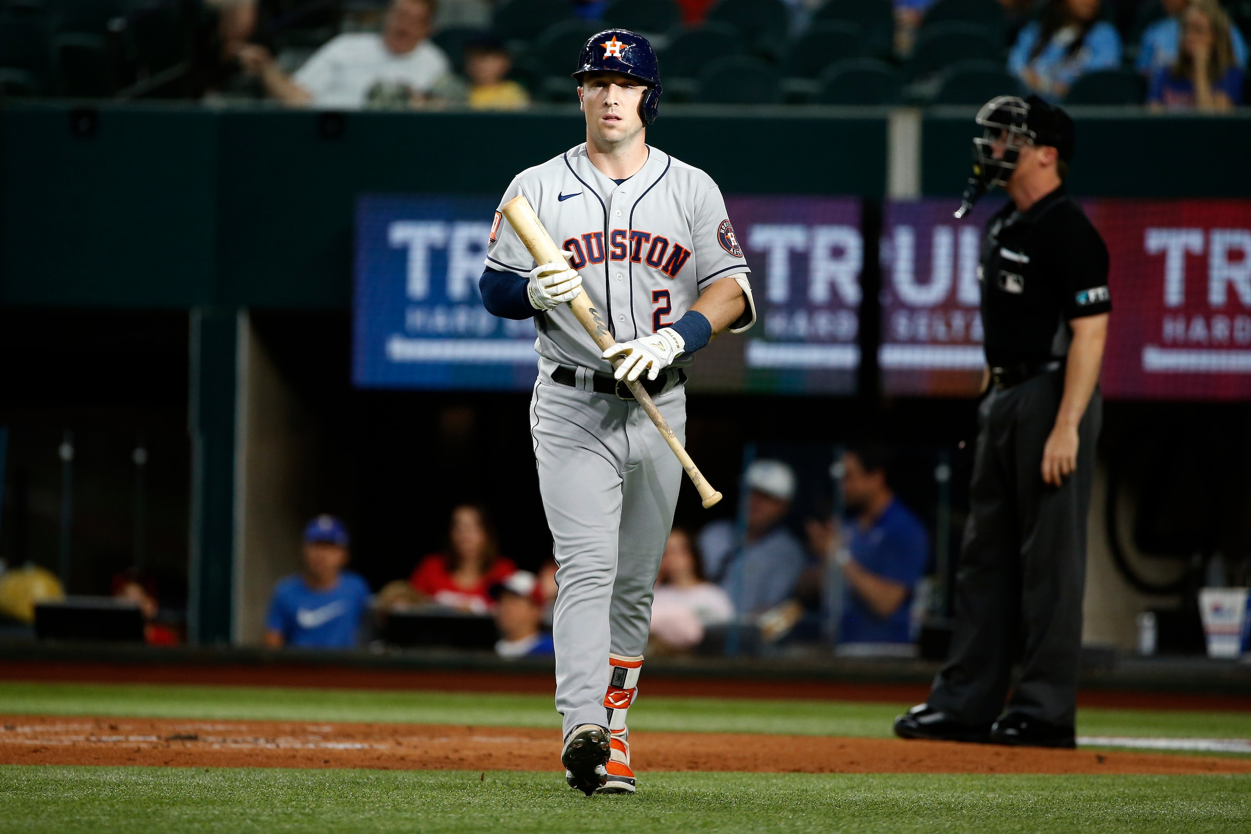 ARLINGTON, TEXAS - JUNE 05: Alex Bregman #2 of the Houston Astros walks back to the dugout after striking out in the first inning against the Texas Rangers at Globe Life Field on June 05, 2022 in Arlington, Texas. (Photo by Tim Heitman/Getty Images)