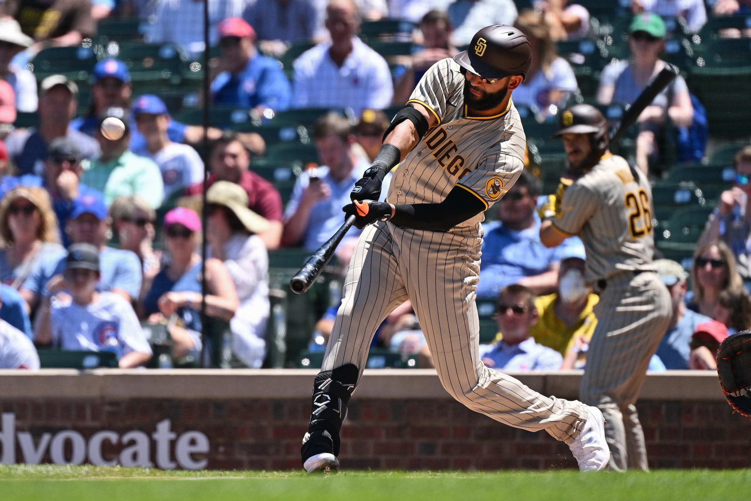 CHICAGO, IL - JUNE 16:  Nomar Mazara #16 of the San Diego Padres hits a two-run home run in the second inning against the Chicago Cubs at Wrigley Field on June 16, 2022 in Chicago, Illinois.  (Photo by Jamie Sabau/Getty Images)