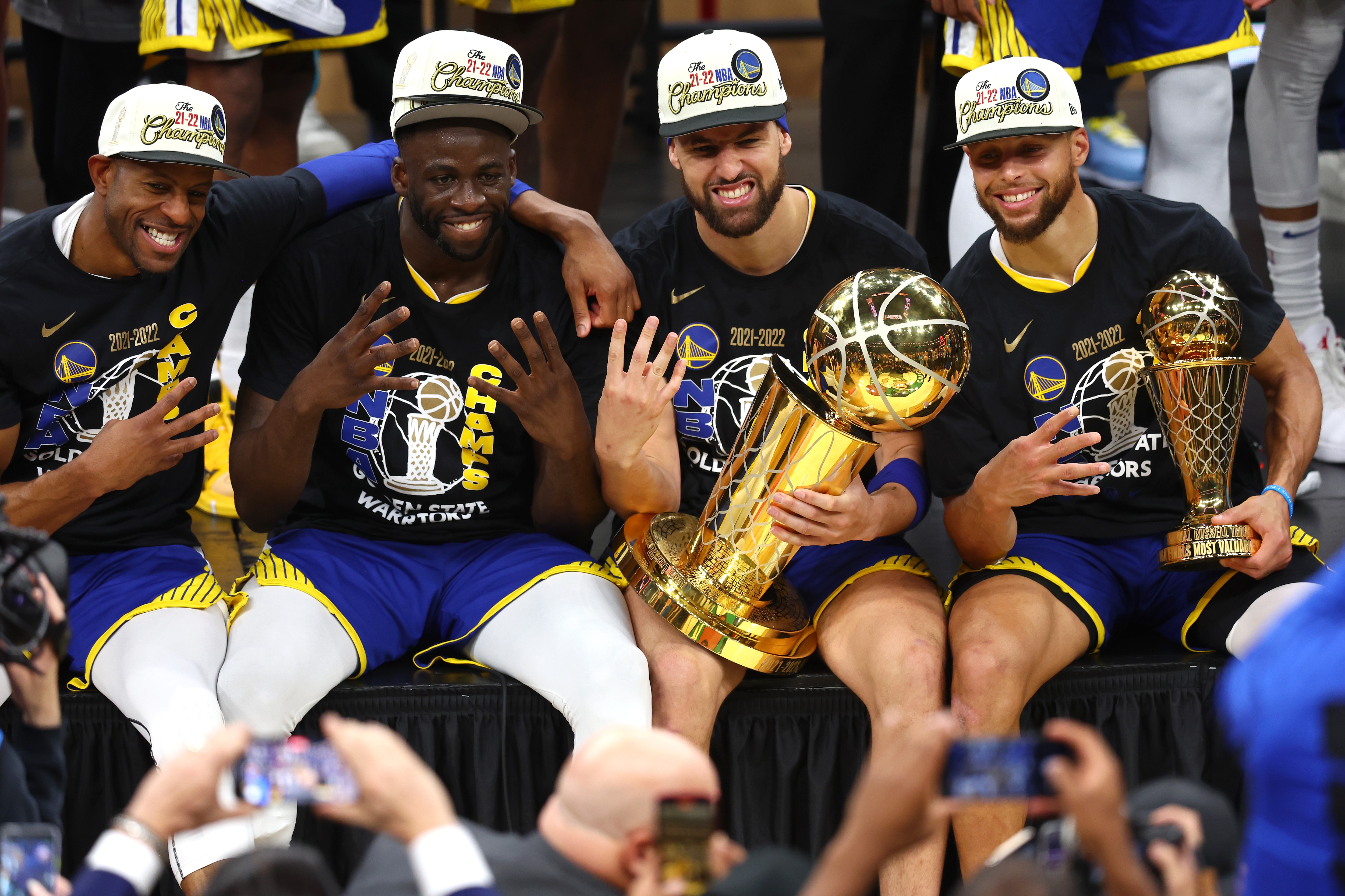 BOSTON, MASSACHUSETTS - JUNE 16: Andre Iguodala #9, Draymond Green #23, Klay Thompson #11 and Stephen Curry #30 of the Golden State Warriors pose for a photo after defeating the Boston Celtics 103-90 in Game Six of the 2022 NBA Finals at TD Garden on June 16, 2022 in Boston, Massachusetts. NOTE TO USER: User expressly acknowledges and agrees that, by downloading and/or using this photograph, User is consenting to the terms and conditions of the Getty Images License Agreement. (Photo by Adam Glanzman/Getty Images)