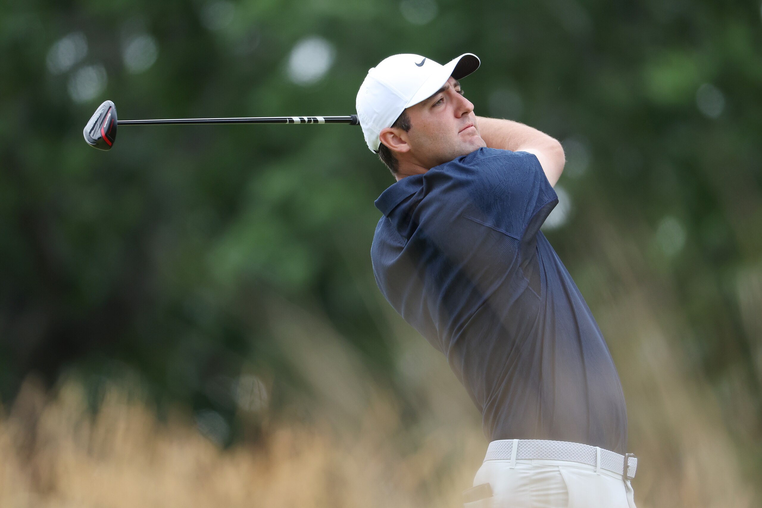 BROOKLINE, MASSACHUSETTS - JUNE 16: Scottie Scheffler of the United States plays his shot from the tenth tee during round one of the 122nd U.S. Open Championship at The Country Club on June 16, 2022 in Brookline, Massachusetts. (Photo by Warren Little/Getty Images)