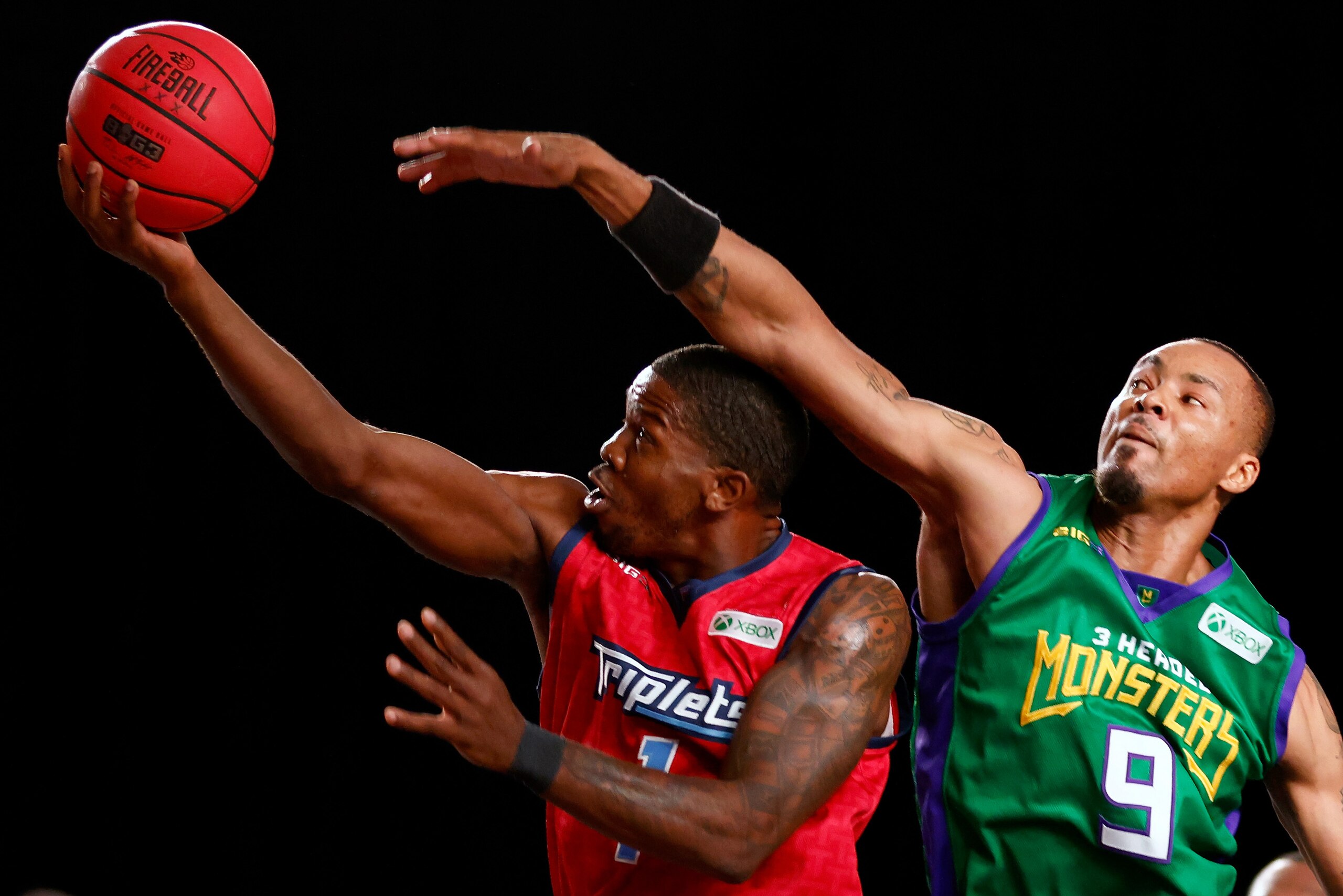 NASSAU, BAHAMAS - AUGUST 28: Joe Johnson #1 of the Triplets attempts a shot while being guarded by Rashard Lewis #9 of the 3 Headed Monsters during the BIG3 - Playoffs at Atlantis Paradise Island on August 28, 2021 in Nassau, Bahamas. (Photo by Michael Reaves/Getty Images)