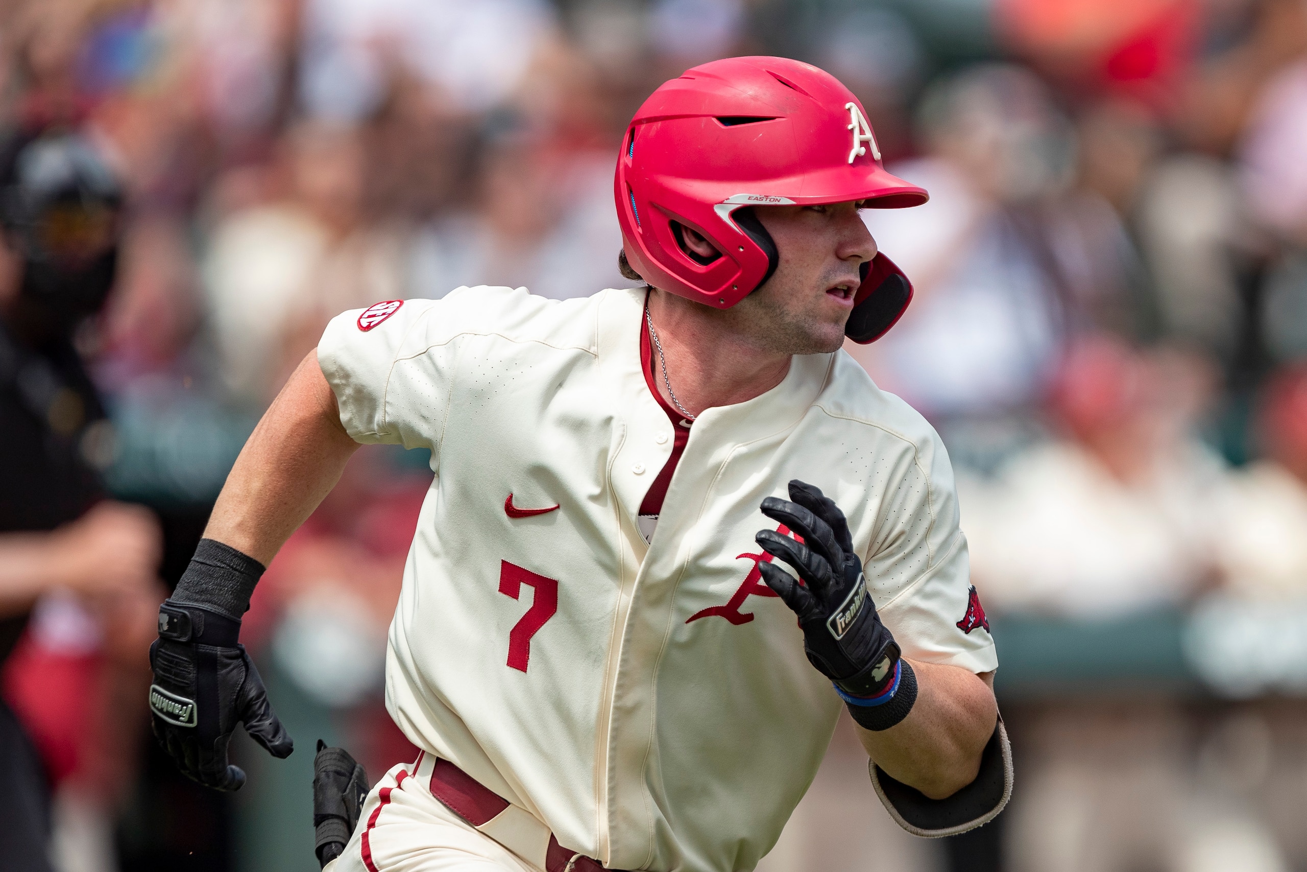 FAYETTEVILLE, ARKANSAS - MAY 22: Cayden Wallace #7 of the Arkansas Razorbacks runs to first base during a game against the Florida Gators at Baum-Walker Stadium at George Cole Field on May 22, 2021 in Fayetteville, Arkansas. The Razorbacks defeated the Gators to sweep the series 9-3.  (Photo by Wesley Hitt/Getty Images)