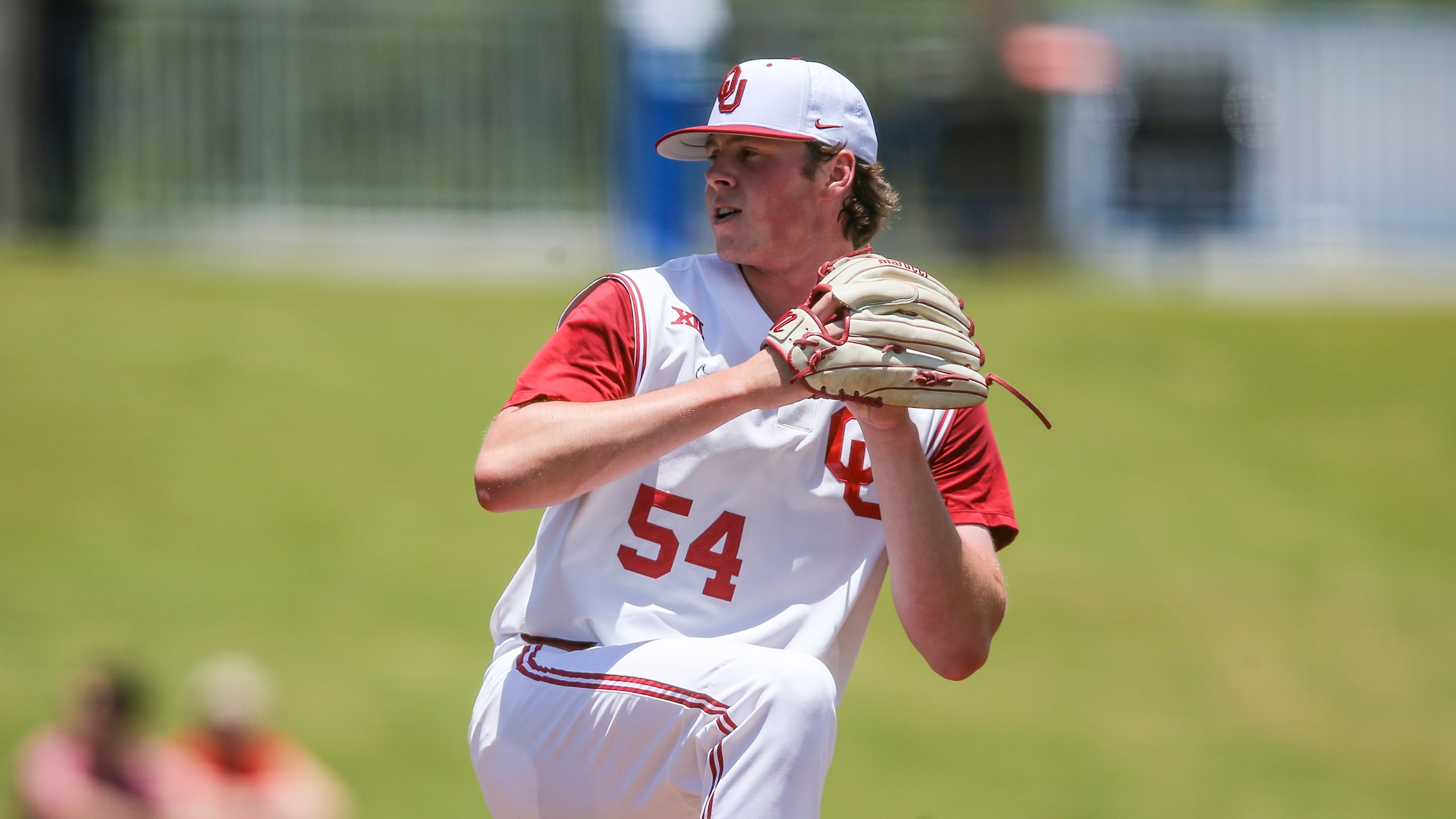 Oklahoma starting pitcher Jake Bennett (54) during an NCAA regional championship baseball game against Liberty on Friday, June 3, 2022 in Gainesville, Fla. (AP Photo/Gary McCullough)