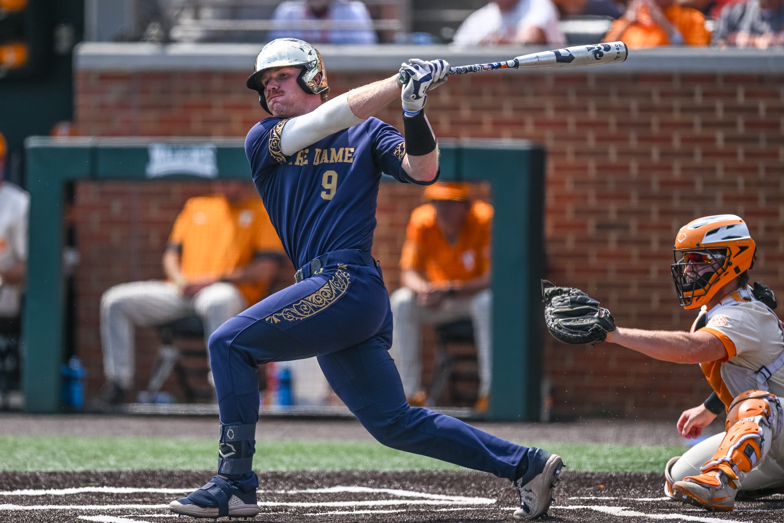 KNOXVILLE, TN - JUNE 12: Notre Dame infielder Jack Brannigan (9) hits the ball during game three of the NCAA Super Regionals between the Tennessee Volunteers and Notre Dame Fighting Irish on June 12, 2022, at Lindsey Nelson Stadium in Knoxville, TN. (Photo by Bryan Lynn/Icon Sportswire via Getty Images)
