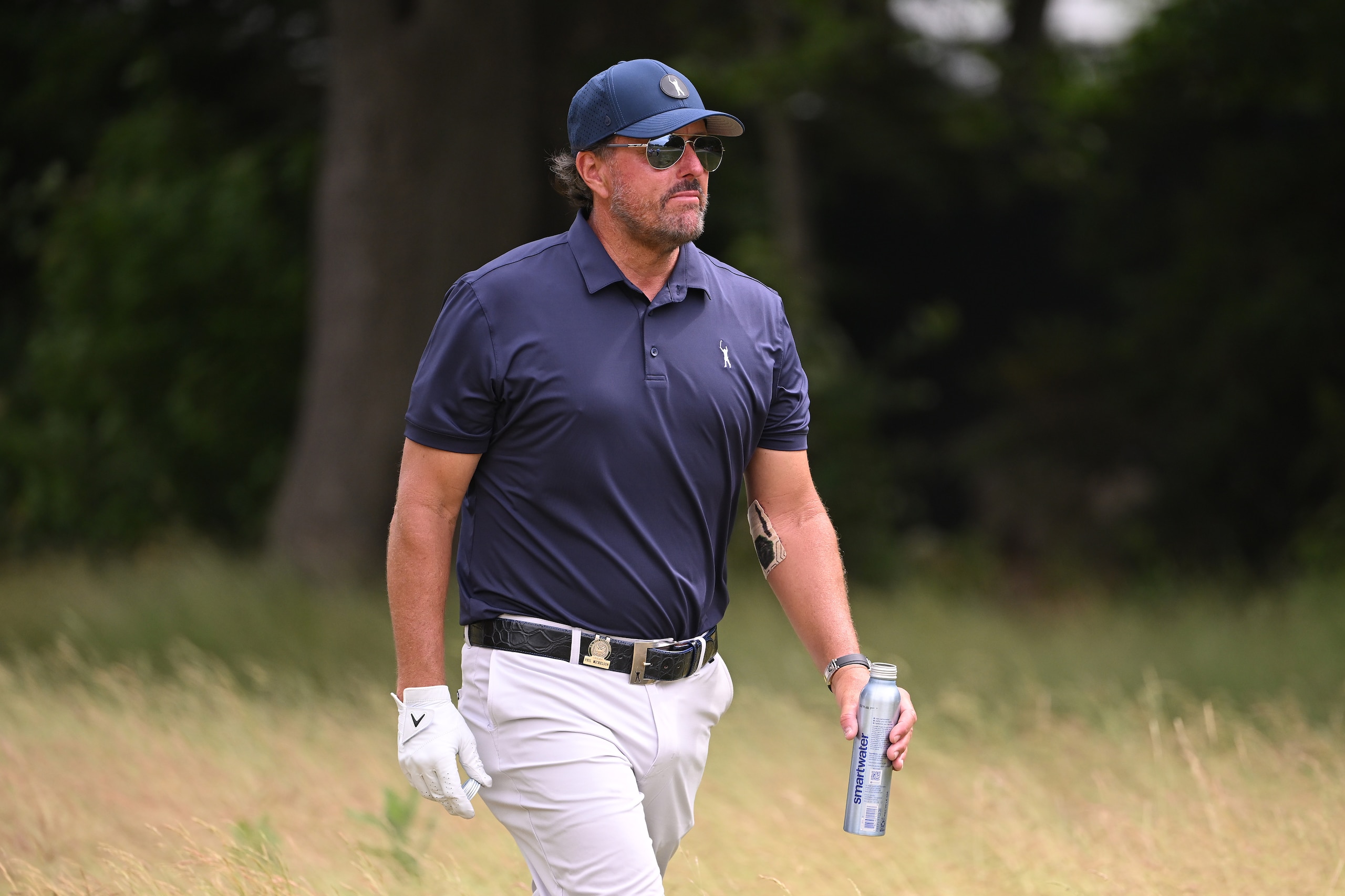 BROOKLINE, MASSACHUSETTS - JUNE 17: Phil Mickelson of the United States walks the 17th hole during the second round of the 122nd U.S. Open Championship at The Country Club on June 17, 2022 in Brookline, Massachusetts. (Photo by Ross Kinnaird/Getty Images)