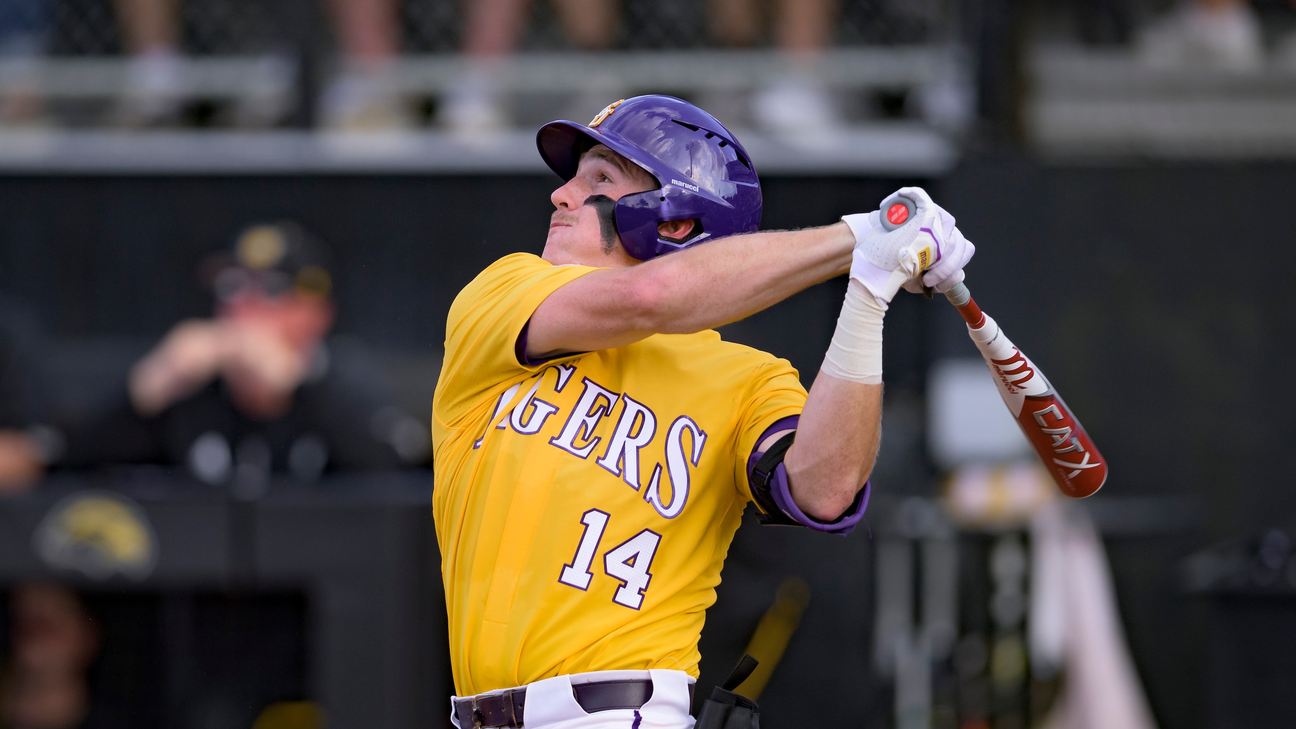 LSU utility Jacob Berry (14) bats against Kennesaw St. during an NCAA regional baseball game on Friday, June 3, 2022, in Hattiesburg, Miss. (AP Photo/Matthew Hinton)