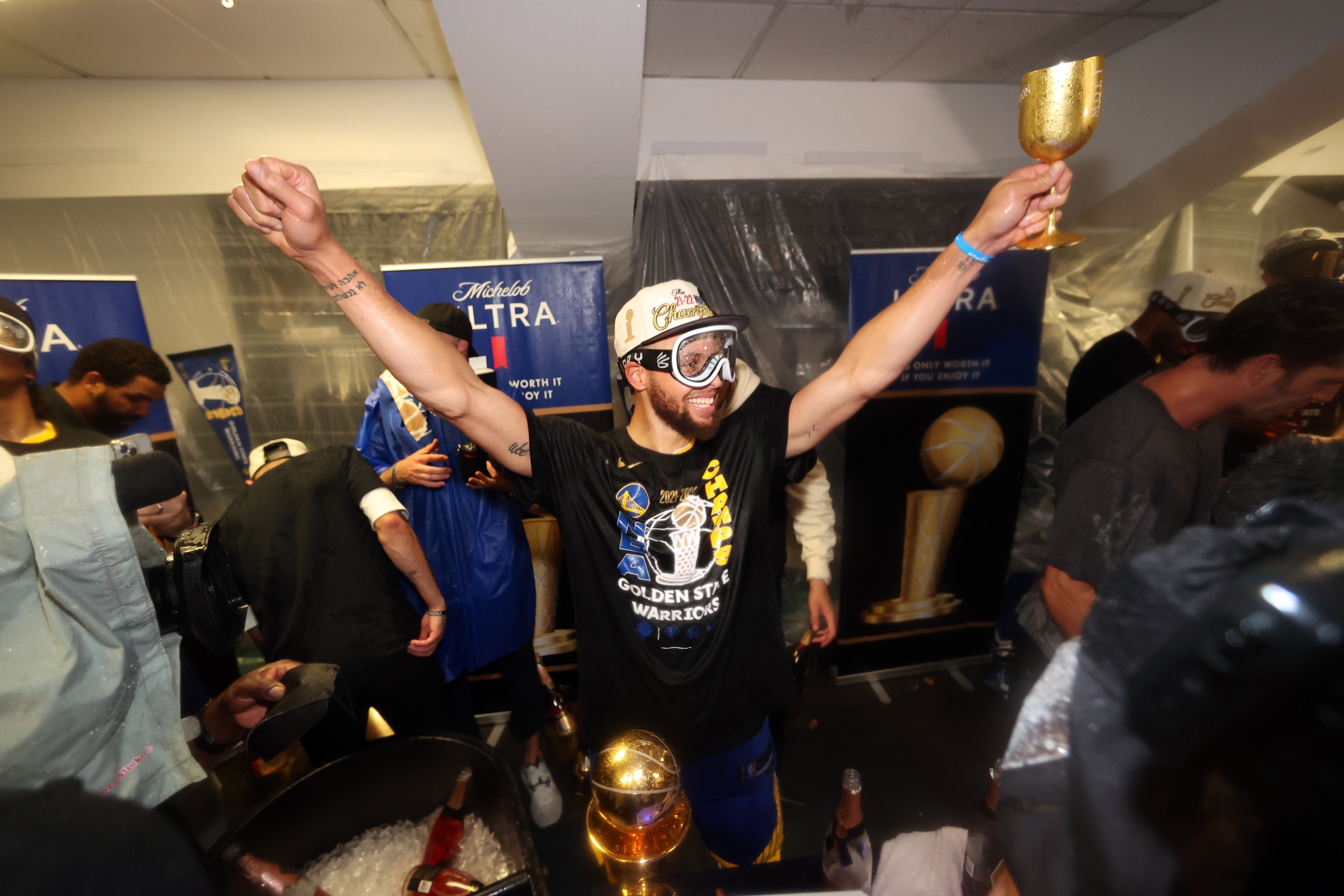 BOSTON, MA - JUNE 16: Stephen Curry #30 of the Golden State Warriors celebrates with the Bill Russell NBA Finals MVP Award after the game Game Six of the 2022 NBA Finals on June 16, 2022 at TD Garden in Boston, Massachusetts. NOTE TO USER: User expressly acknowledges and agrees that, by downloading and or using this photograph, user is consenting to the terms and conditions of Getty Images License Agreement. Mandatory Copyright Notice: Copyright 2022 NBAE (Photo by Nathaniel S. Butler/NBAE via Getty Images)