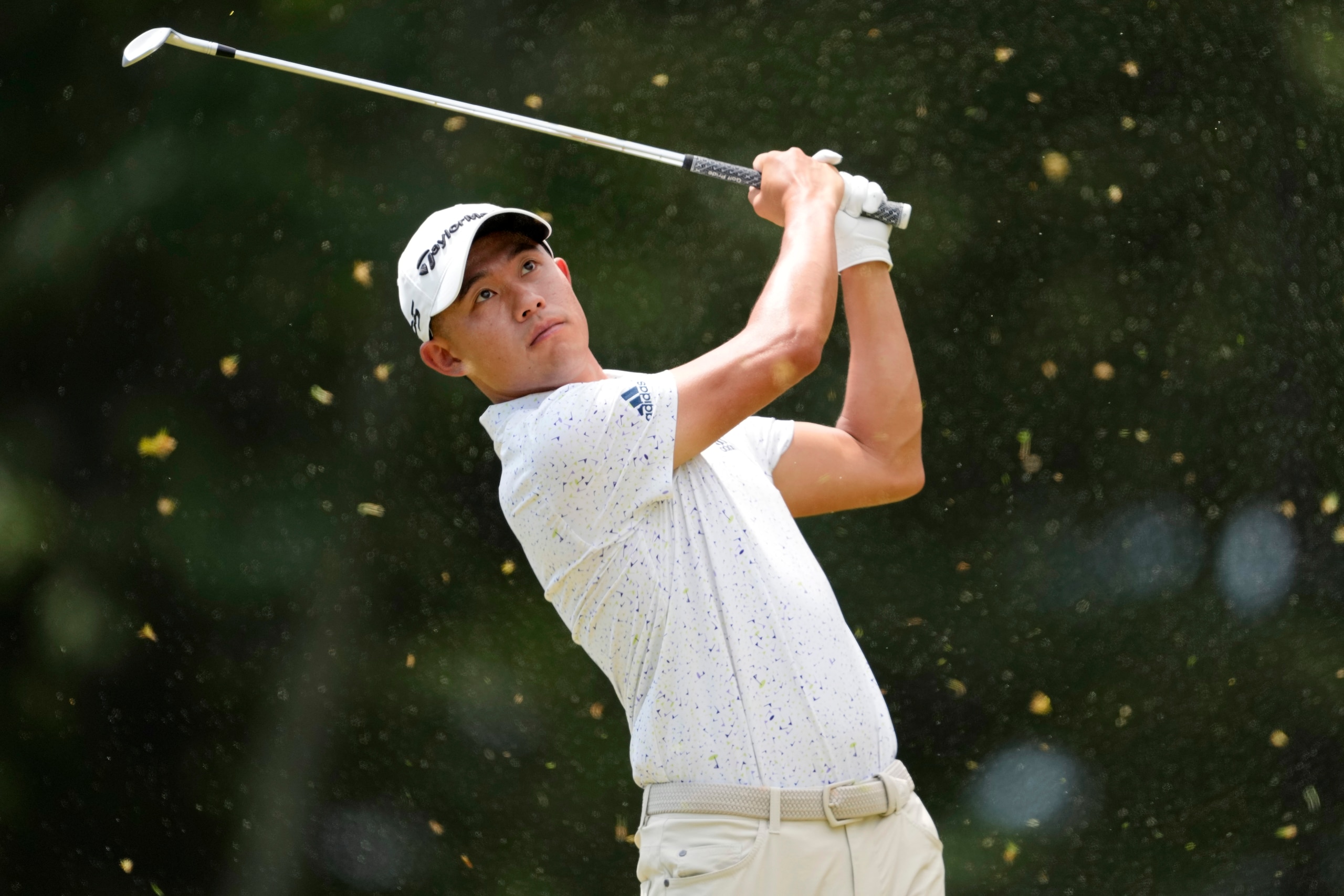 Collin Morikawa watches his shot on the 11th hole during the second round of the U.S. Open golf tournament at The Country Club, Friday, June 17, 2022, in Brookline, Mass. (AP Photo/Robert F. Bukaty)
