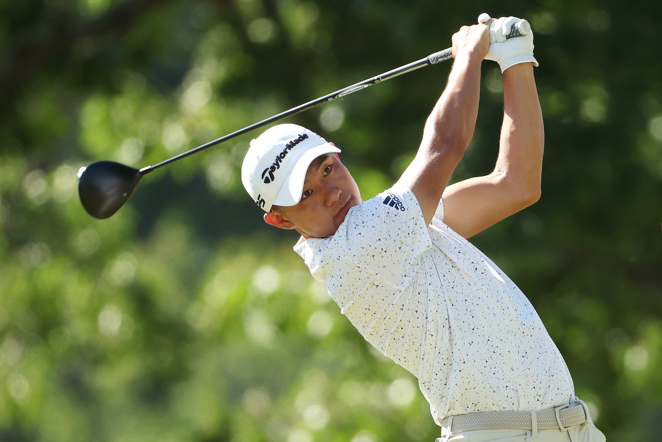 BROOKLINE, MASSACHUSETTS - JUNE 17: Collin Morikawa of the United States plays a tee shot during the second round of the 122nd U.S. Open Championship at The Country Club on June 17, 2022 in Brookline, Massachusetts. (Photo by Patrick Smith/Getty Images)