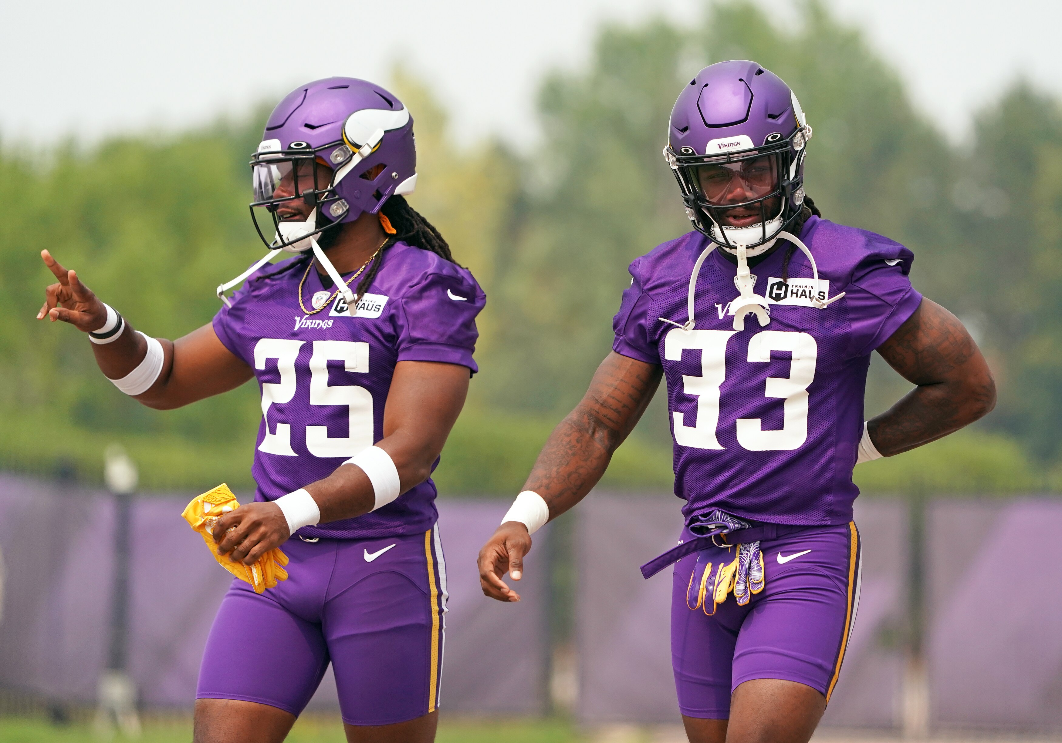 EAGAN, MN - JULY 29: Minnesota Vikings running back Alexander Mattison (25) and Minnesota Vikings running back Dalvin Cook (33) walk to the field before training camp at Twin Cities Orthopedics Performance Center in Eagan, MN on July 29, 2021.(Photo by Nick Wosika/Icon Sportswire via Getty Images)