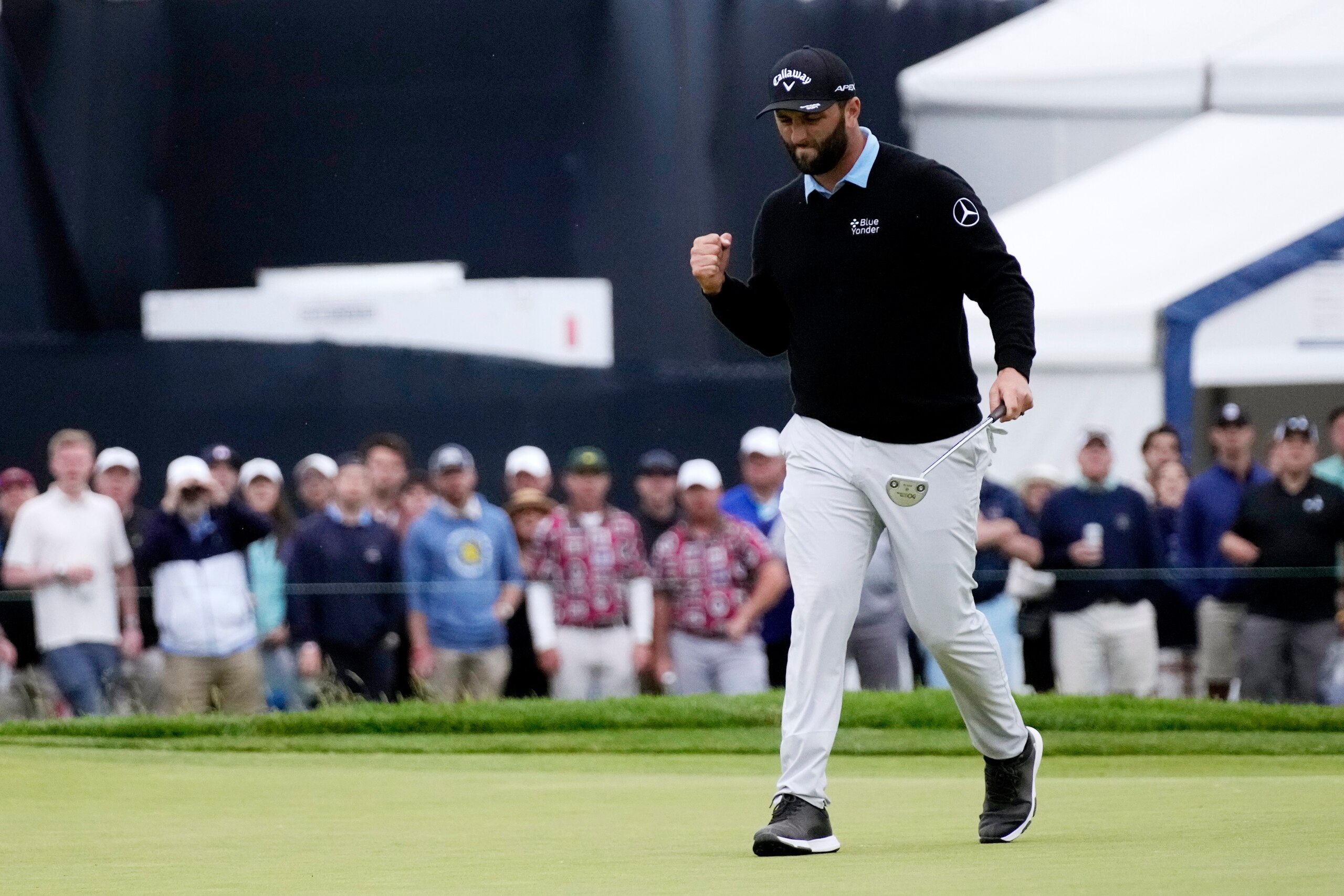 Jon Rahm, of Spain, reacts after making a putt on the 15th hole during the third round of the U.S. Open golf tournament at The Country Club, Saturday, June 18, 2022, in Brookline, Mass. (AP Photo/Robert F. Bukaty)