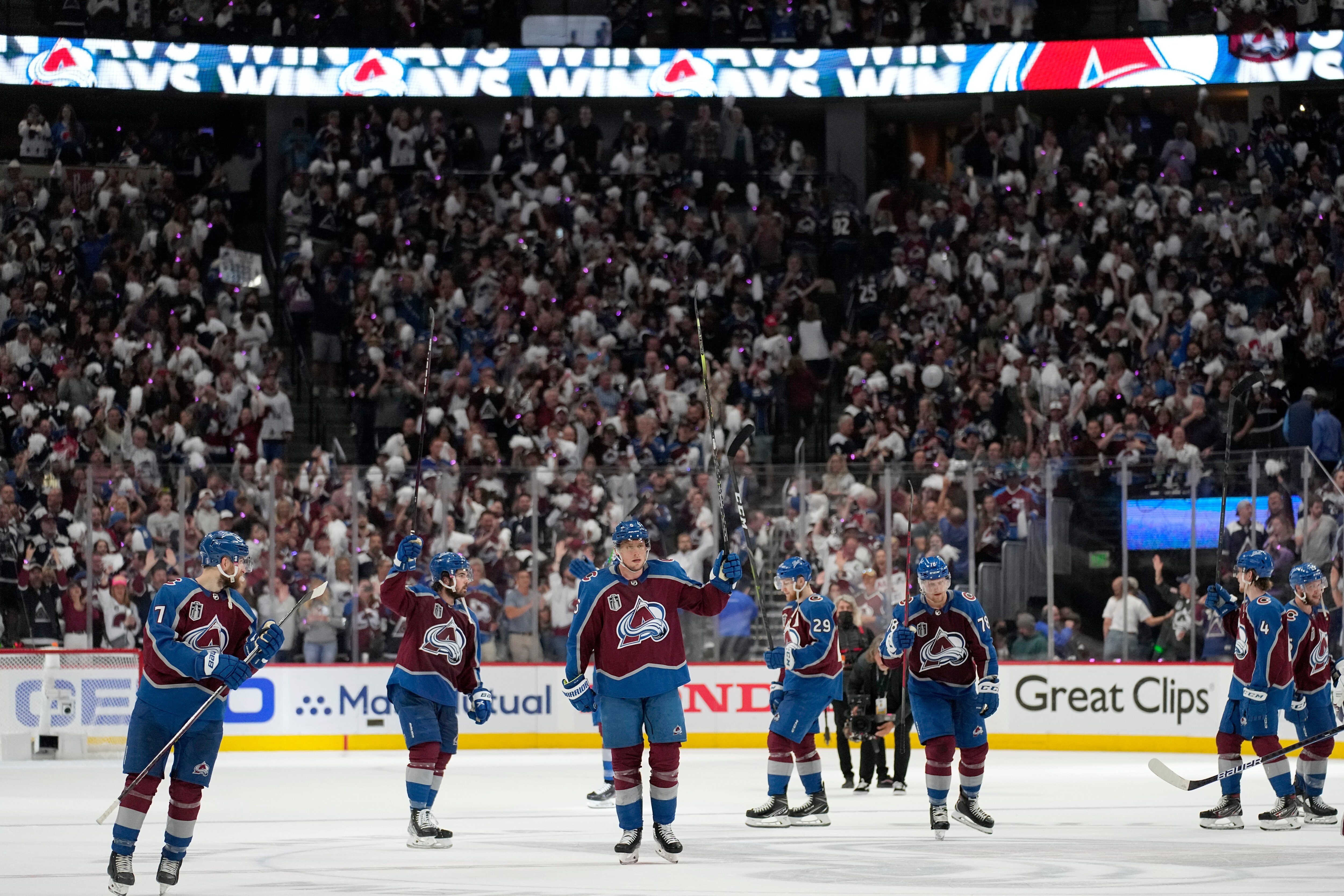 Colorado Avalanche players celebrate after the Avalanche defeated the Tampa Bay Lightning 7-0 in Game 2 of the NHL hockey Stanley Cup Final, Saturday, June 18, 2022, in Denver. (AP Photo/John Locher)