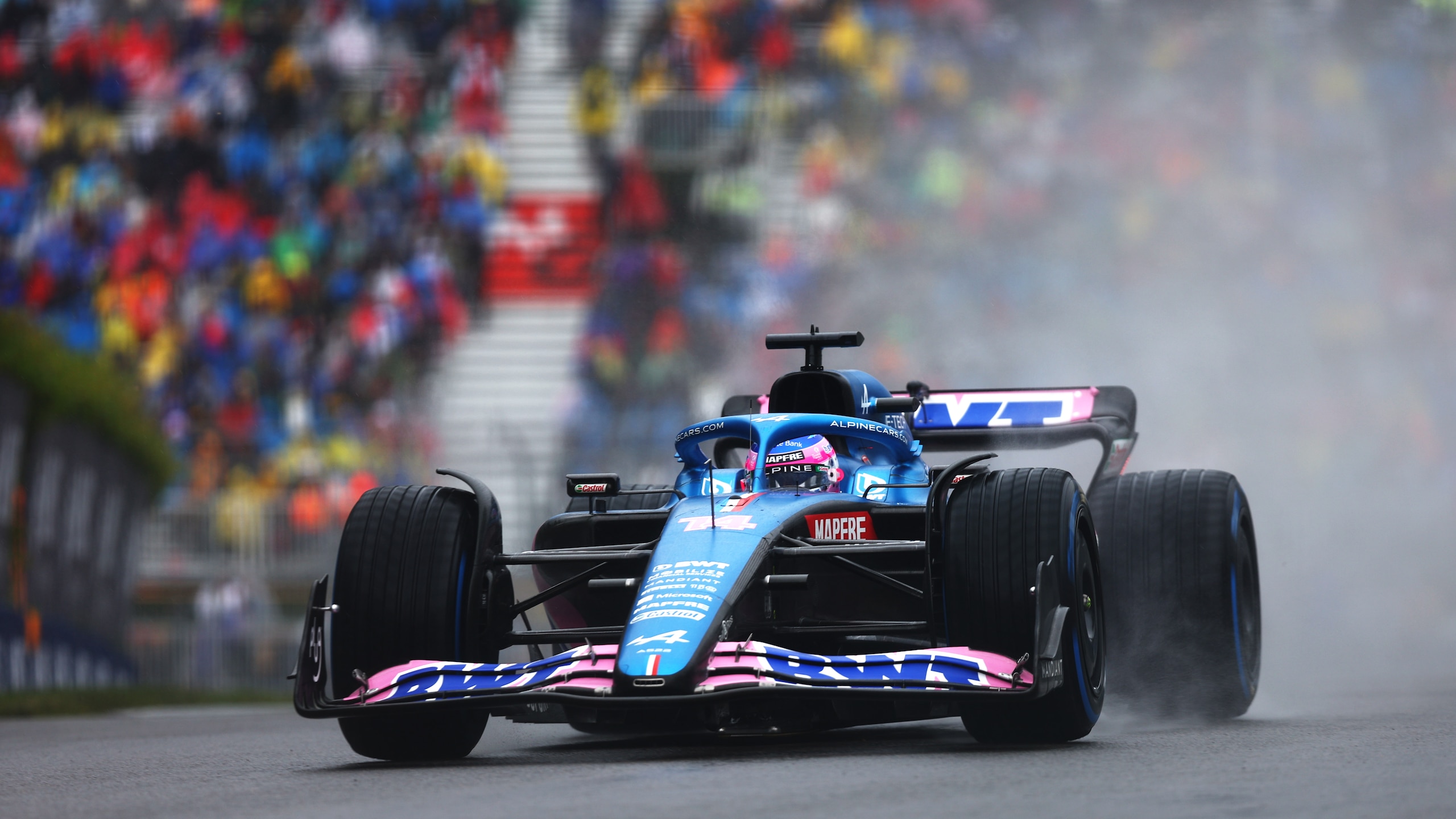MONTREAL, QUEBEC - JUNE 18: Fernando Alonso of Spain driving the (14) Alpine F1 A522 Renault in the wet during final practice ahead of the F1 Grand Prix of Canada at Circuit Gilles Villeneuve on June 18, 2022 in Montreal, Quebec. (Photo by Lars Baron - Formula 1/Formula 1 via Getty Images)