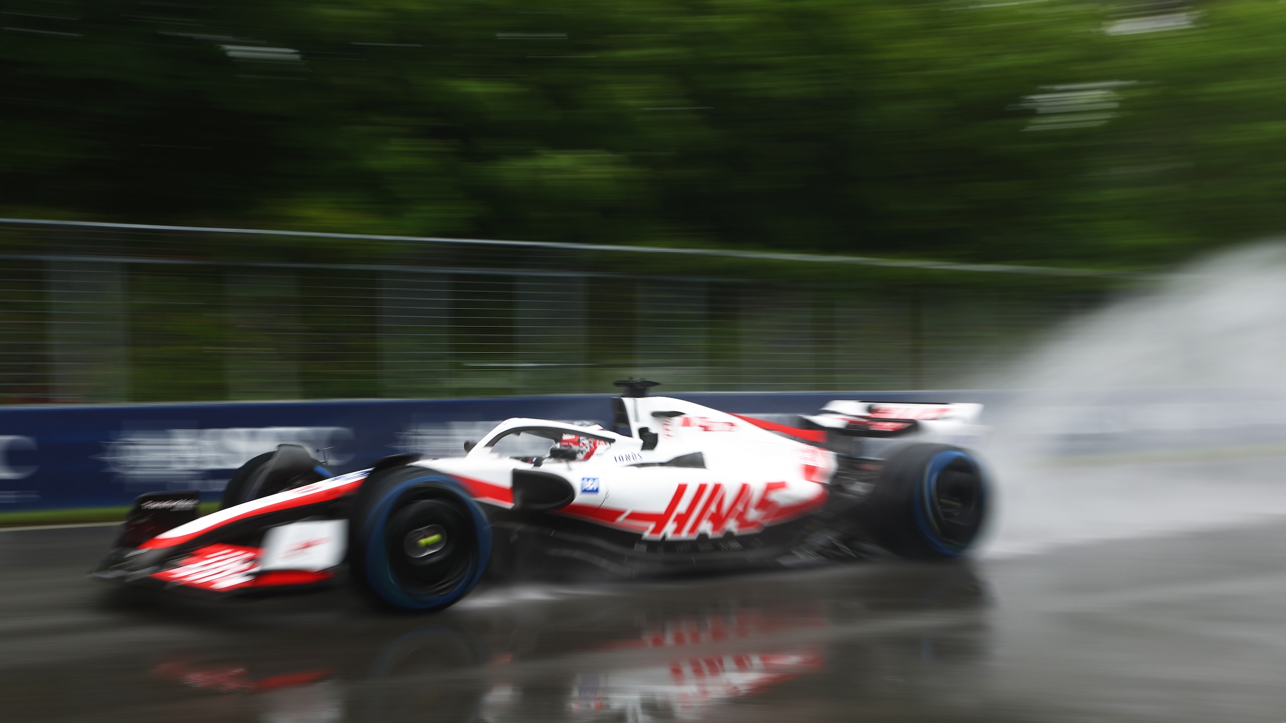 MONTREAL, QUEBEC - JUNE 18: Kevin Magnussen of Denmark driving the (20) Haas F1 VF-22 Ferrari in the wet during final practice ahead of the F1 Grand Prix of Canada at Circuit Gilles Villeneuve on June 18, 2022 in Montreal, Quebec. (Photo by Lars Baron - Formula 1/Formula 1 via Getty Images)
