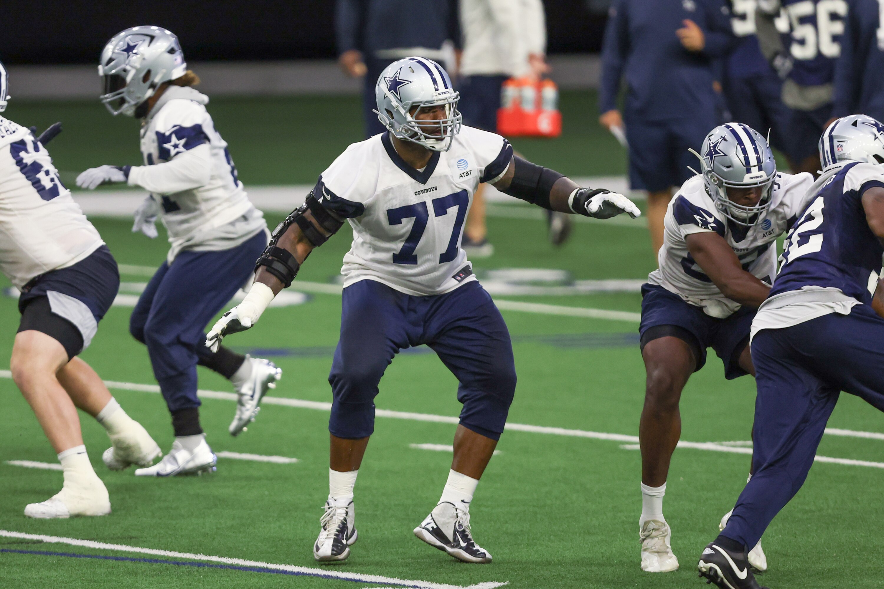 FRISCO, TX - JUNE 02: Dallas Cowboys tackle Tyron Smith (77) blocks during the Dallas Cowboys OTA Offseason Workouts on June 2, 2022 at The Star in Frisco, TX. (Photo by George Walker/Icon Sportswire via Getty Images)