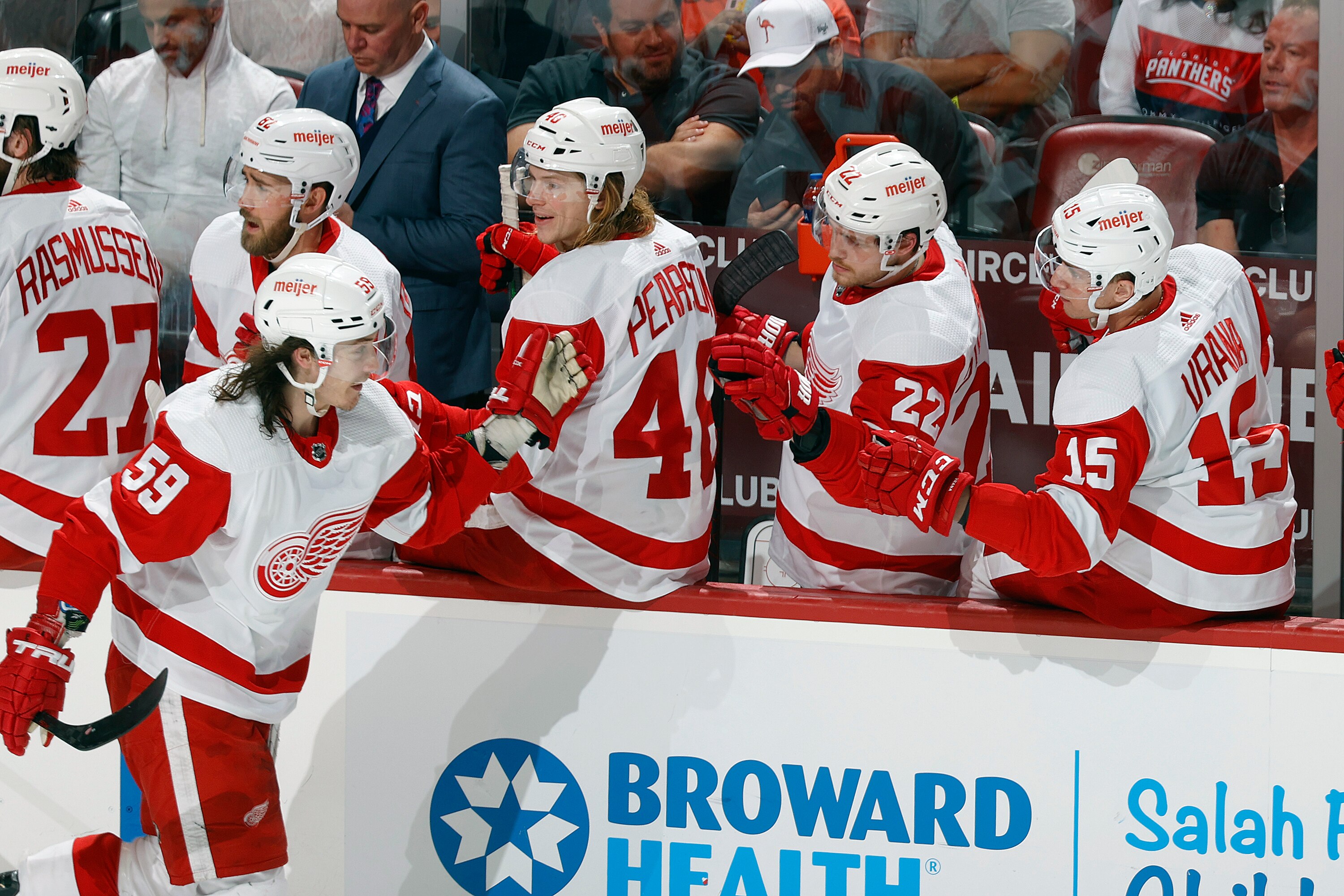 SUNRISE, FL - APRIL 21: Teammates congratulate Tyler Bertuzzi #59 of the Detroit Red Wings after he scored a second period goal against the Florida Panthers at the FLA Live Arena on April 21, 2022 in Sunrise, Florida. (Photo by Joel Auerbach/Getty Images)