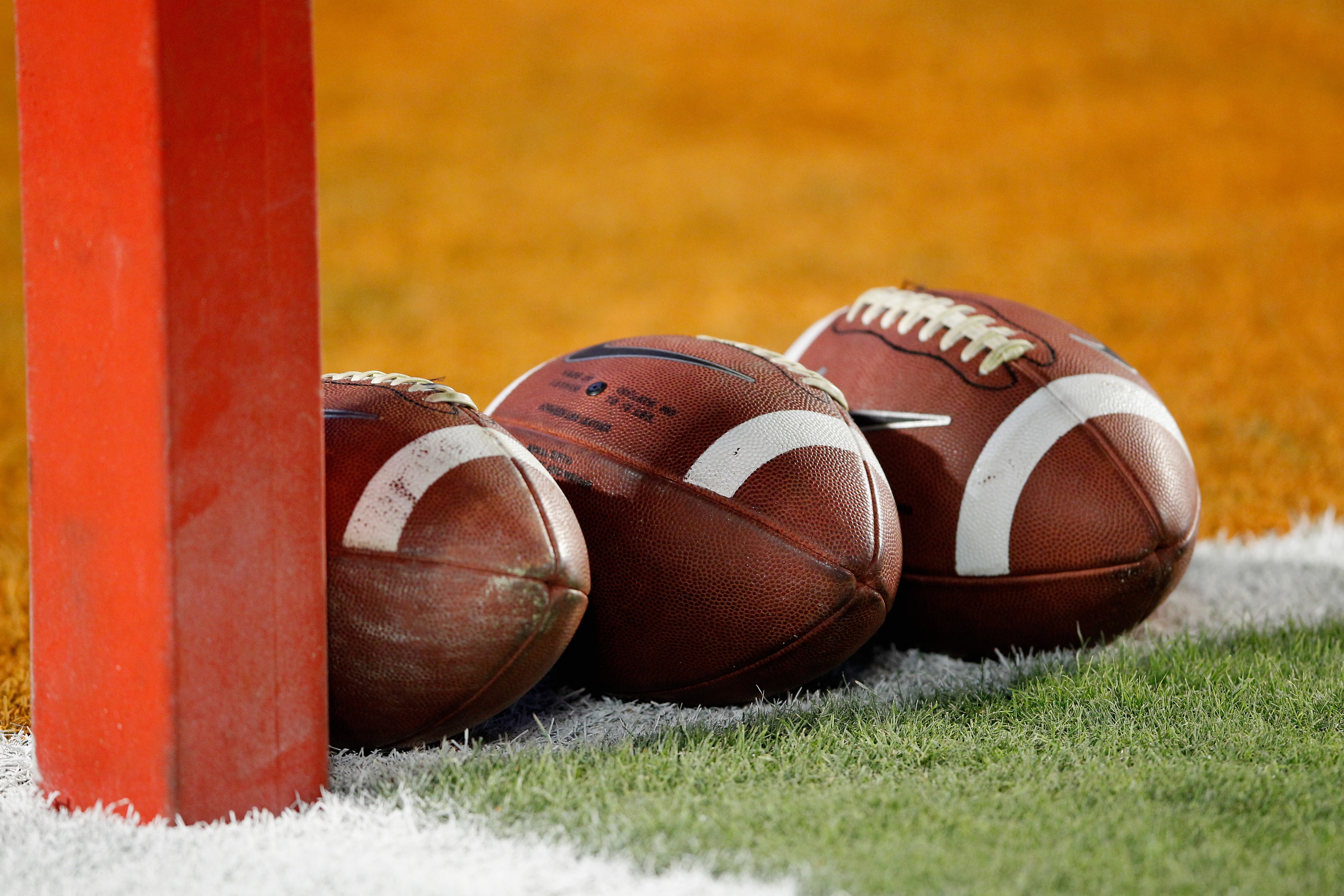 MIAMI GARDENS, FL - JANUARY 04: A detail of a Nike official NCAA size footballs as they sit in the end zone prior to the West Virginia Mountaineers playing against the Clemson Tigers during the Discover Orange Bowl at Sun Life Stadium on January 4, 2012 in Miami Gardens, Florida. (Photo by Streeter Lecka/Getty Images) MIAMI GARDENS, FL - JANUARY 04: A detail of a Nike official NCAA size footballs as they sit in the end zone prior to the West Virginia Mountaineers playing against the Clemson Tigers during the Discover Orange Bowl at Sun Life Stadium on January 4, 2012 in Miami Gardens, Florida. (Photo by Streeter Lecka/Getty Images)