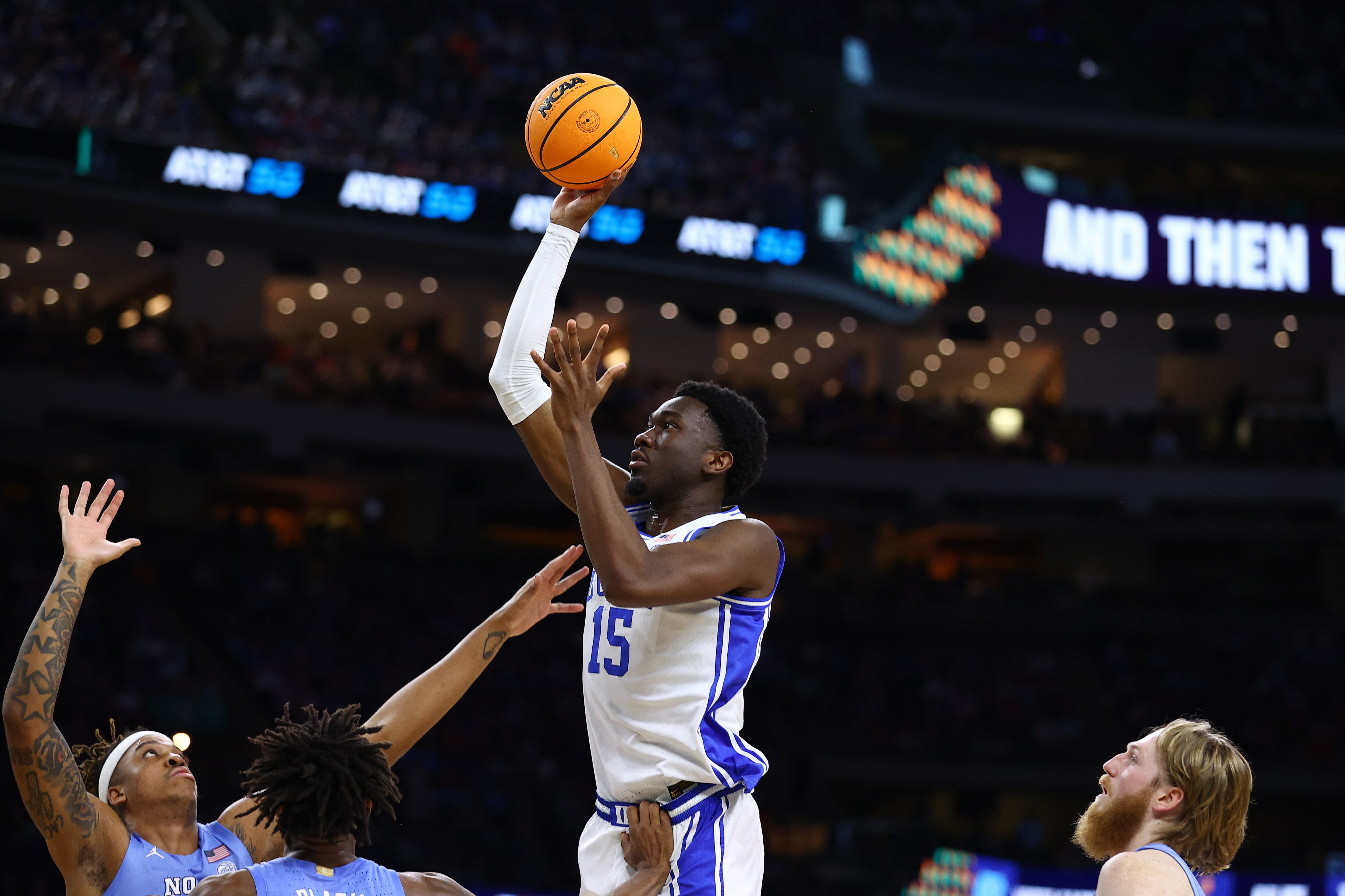 NEW ORLEANS, LOUISIANA - APRIL 02: Mark Williams #15 of the Duke Blue Devils shoots the ball over North Carolina Tar Heels during the second half in the semifinal game of the 2022 NCAA Men's Basketball Tournament Final Four at Caesars Superdome on April 02, 2022 in New Orleans, Louisiana. (Photo by Jamie Schwaberow/NCAA Photos via Getty Images)