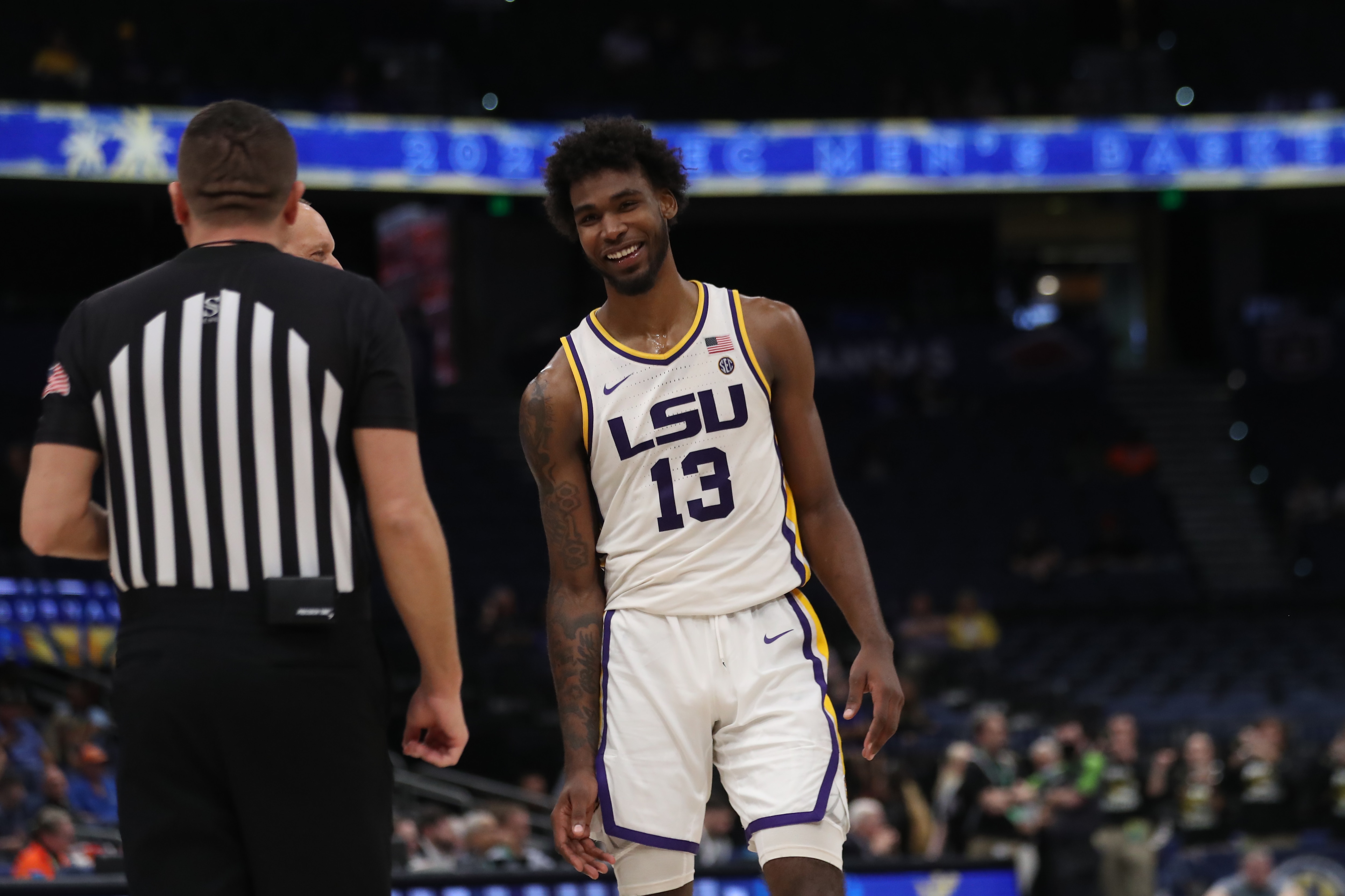 TAMPA, FL - MARCH 10: LSU Tigers forward Tari Eason (13) stars a laugh with an official during the SEC Tournament between the Missouri Tigers and the LSU Tigers on Thursday, March 10, 2022, at the Amalie Arena in Tampa, FL. (Photo by Peter Joneleit/Icon Sportswire via Getty Images)