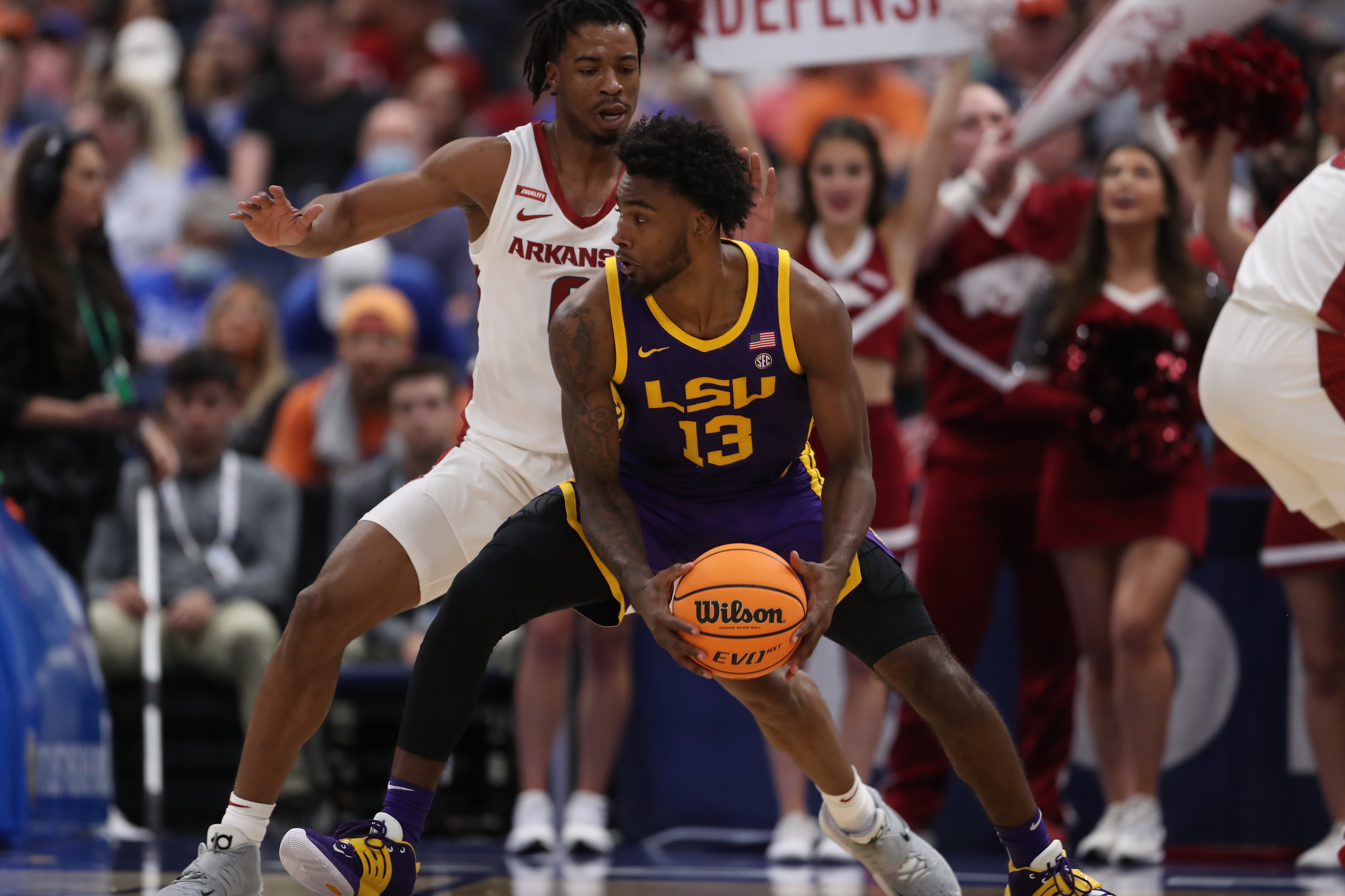 TAMPA, FL - MARCH 11: LSU Tigers forward Tari Eason (13) tries to make a move on a defender during the SEC Tournament between the LSU Tigers and the Arkansas Razorbacks on Thursday, March 11, 2022 at the Amalie Arena in Tampa, FL (Photo by Peter Joneleit/Icon Sportswire via Getty Images)