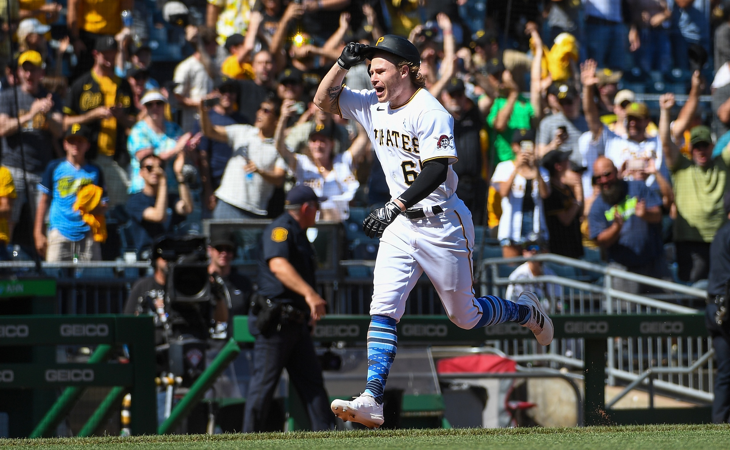 PITTSBURGH, PA - JUNE 19: Jack Suwinski #65 of the Pittsburgh Pirates reacts as he rounds the bases after hitting a walk off solo home run to give the Pirates a 4-3 win over the San Francisco Giants during the game at PNC Park on June 19, 2022 in Pittsburgh, Pennsylvania. (Photo by Justin Berl/Getty Images)