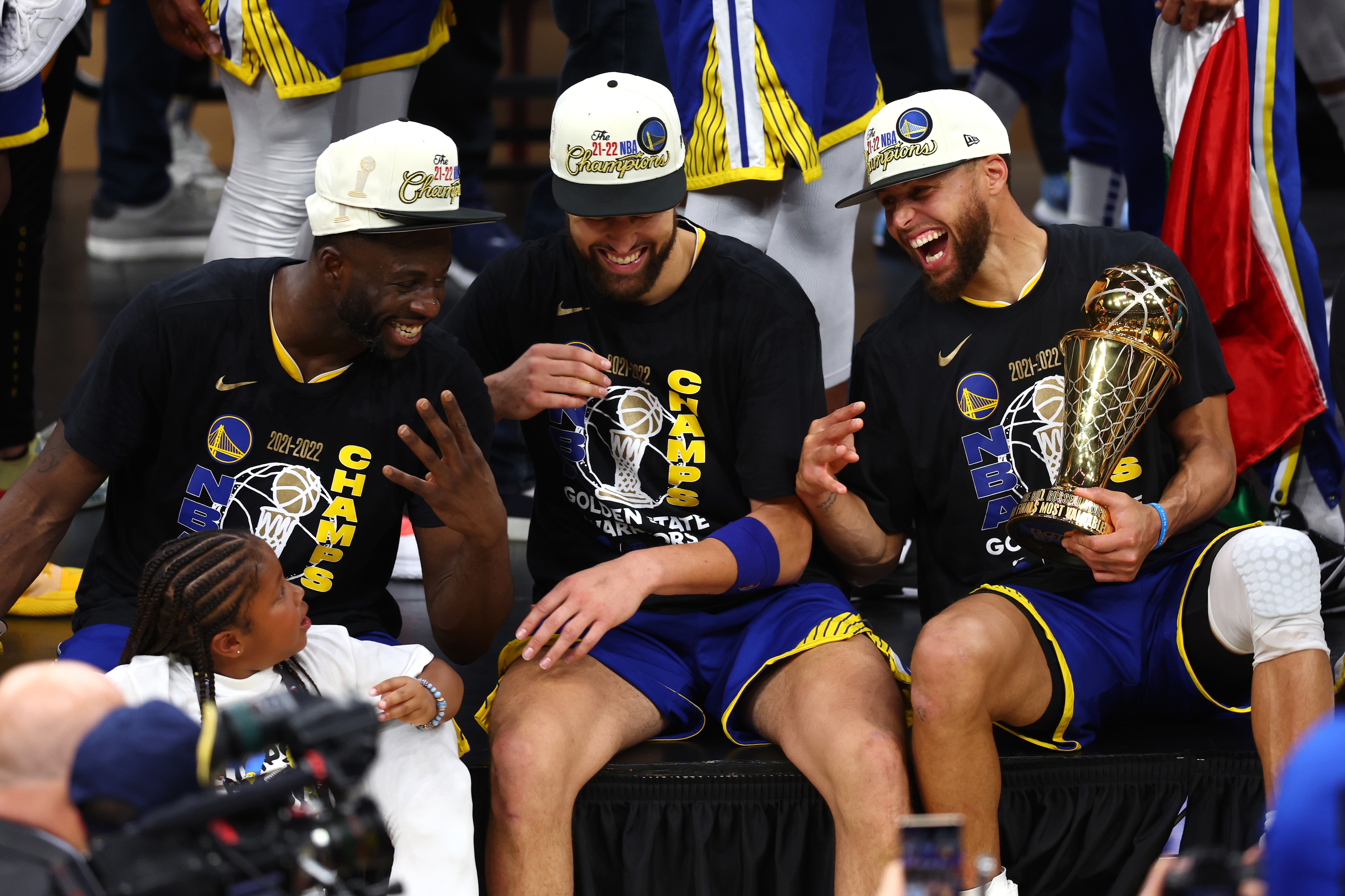 BOSTON, MASSACHUSETTS - JUNE 16: Draymond Green #23, Klay Thompson #11 and Stephen Curry #30 of the Golden State Warriors laugh together after defeating the Boston Celtics 103-90 in Game Six of the 2022 NBA Finals at TD Garden on June 16, 2022 in Boston, Massachusetts. NOTE TO USER: User expressly acknowledges and agrees that, by downloading and/or using this photograph, User is consenting to the terms and conditions of the Getty Images License Agreement. (Photo by Adam Glanzman/Getty Images)
