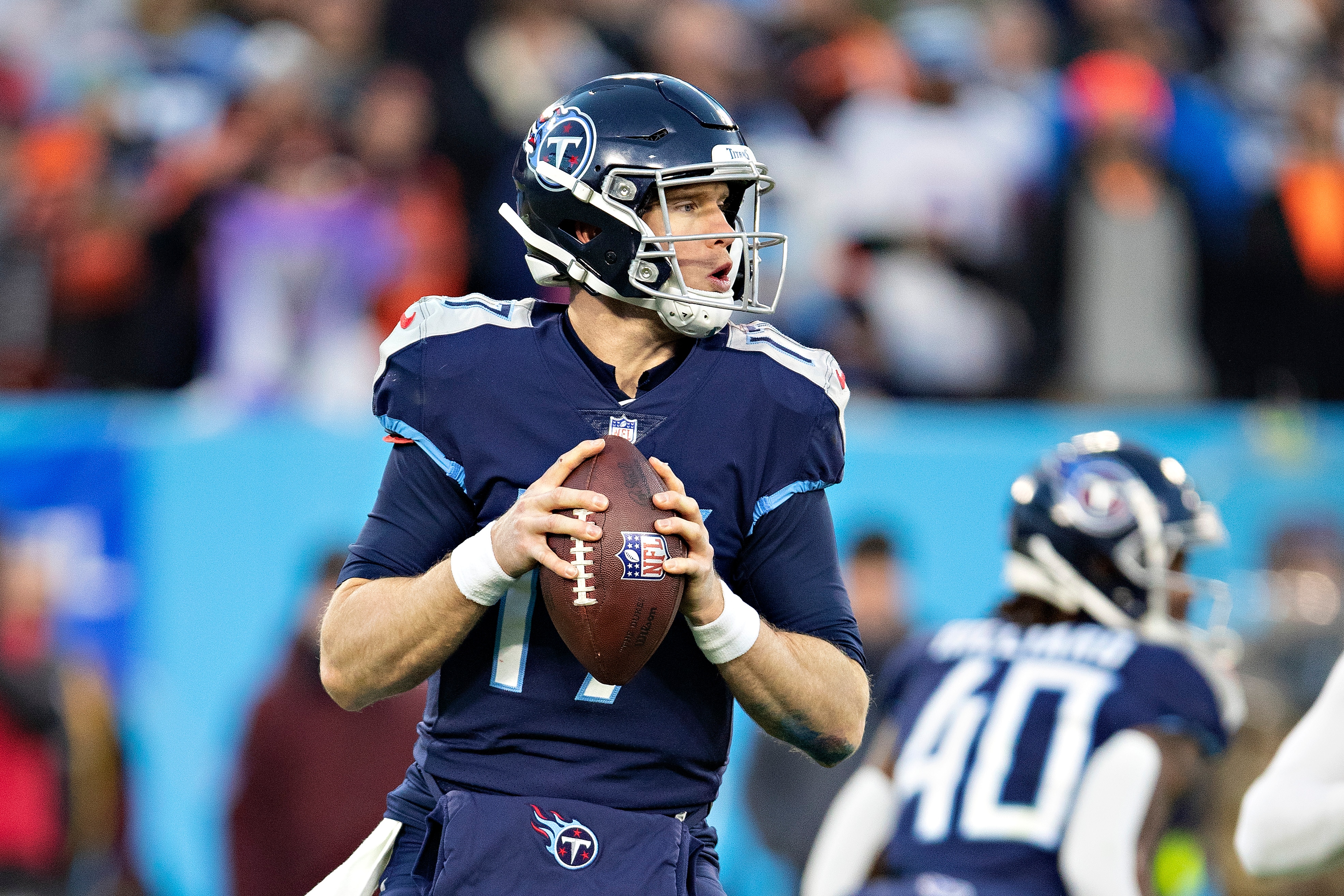 NASHVILLE, TENNESSEE - JANUARY 22: Ryan Tannehill #17 of the Tennessee Titans drops back to pass during a game against the Cincinnati Bengals in the AFC Divisional Playoff game at Nissan Stadium on January 22, 2022 in Nashville, Tennessee. The Bengals defeated the Titans 19-16.  (Photo by Wesley Hitt/Getty Images)