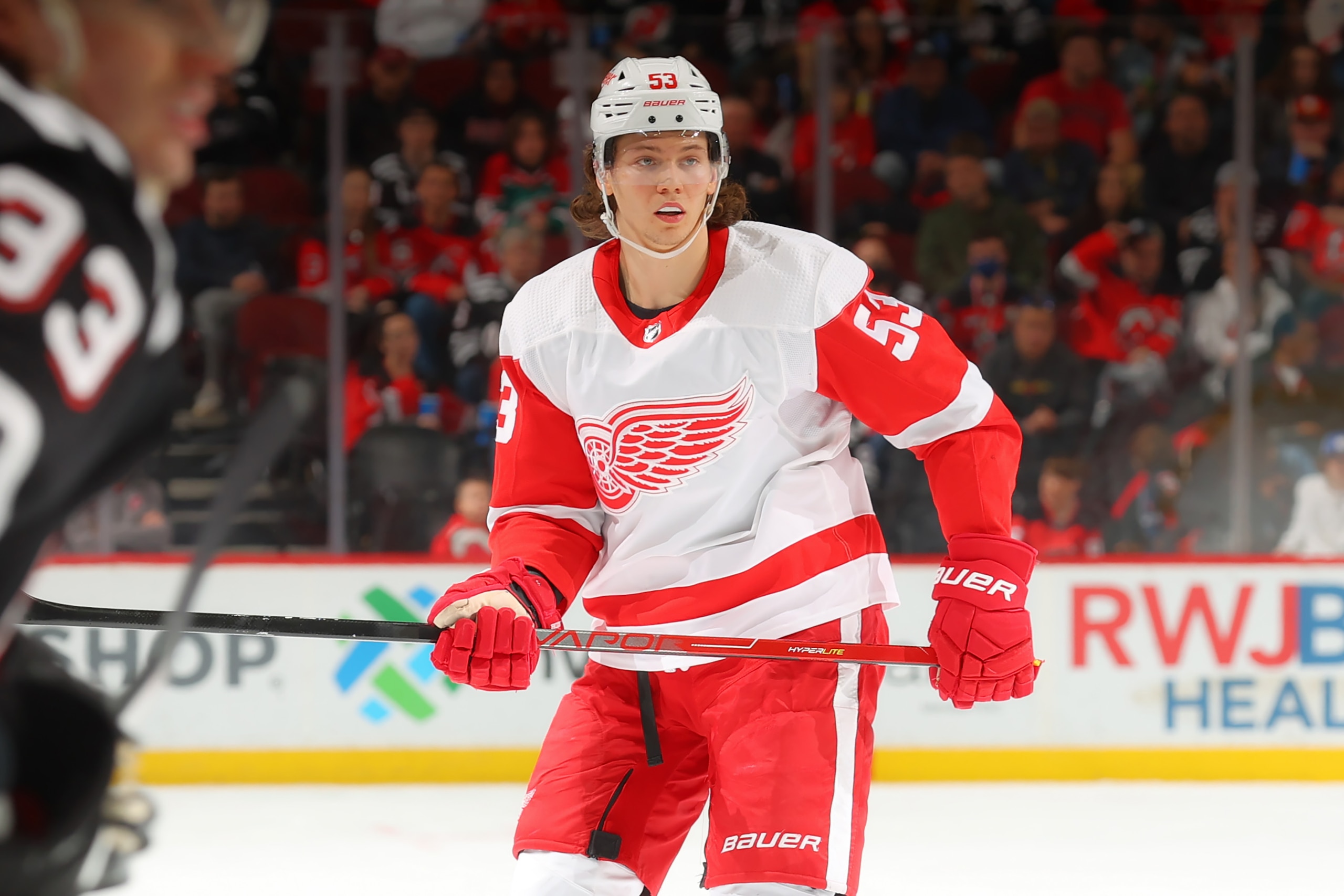 NEWARK, NJ - APRIL  29:  Moritz Seider #53 of the Detroit Red Wings skates against the New Jersey Devils on April 29, 2022 at the Prudential Center in Newark, New Jersey.  (Photo by Rich Graessle/Getty Images)