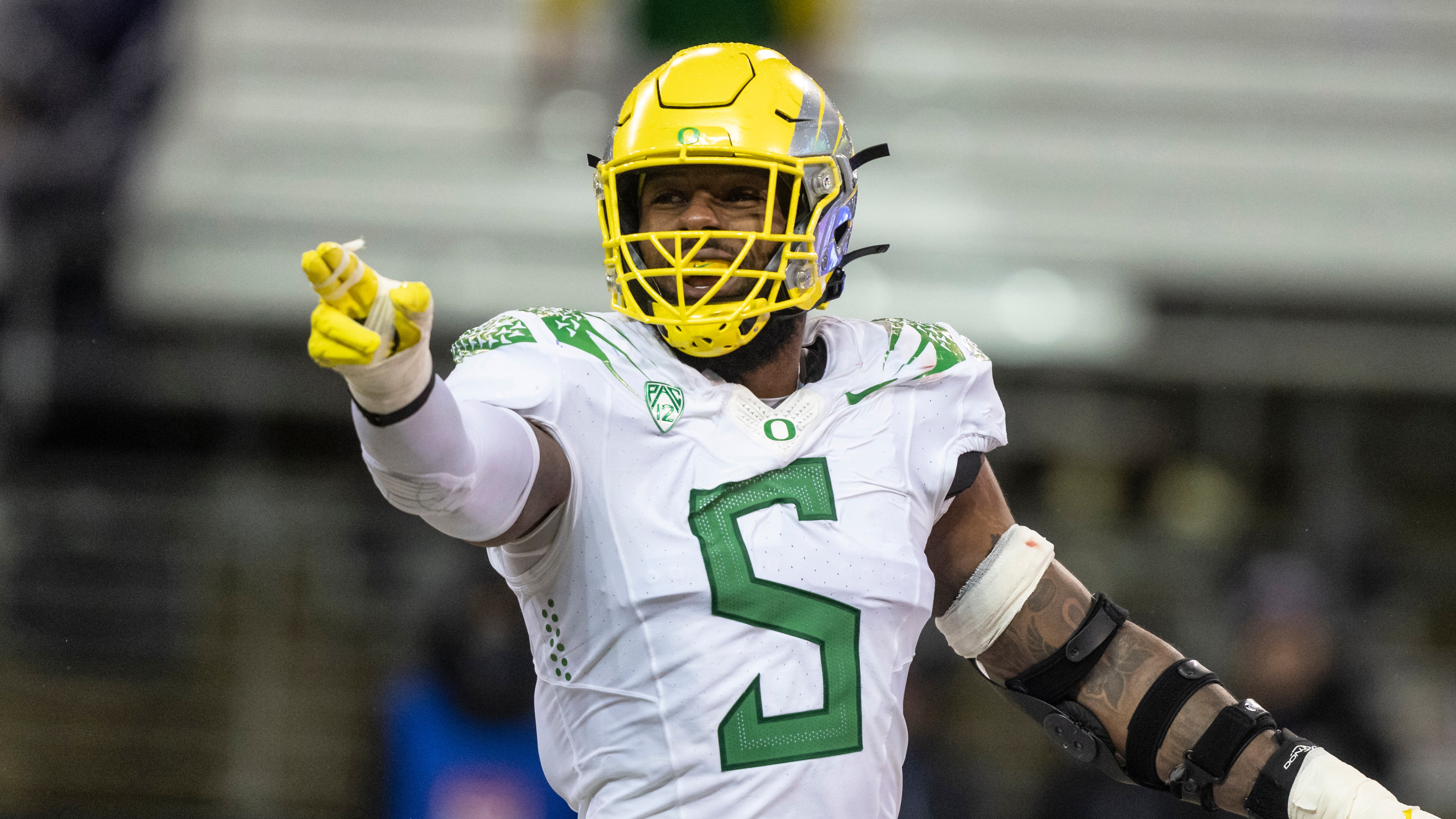 FILE - Oregon defensive end Kayvon Thibodeaux gestures during an NCAA college football game against Washington, Nov. 6, 2021, in Seattle. (AP Photo/Stephen Brashear, file)