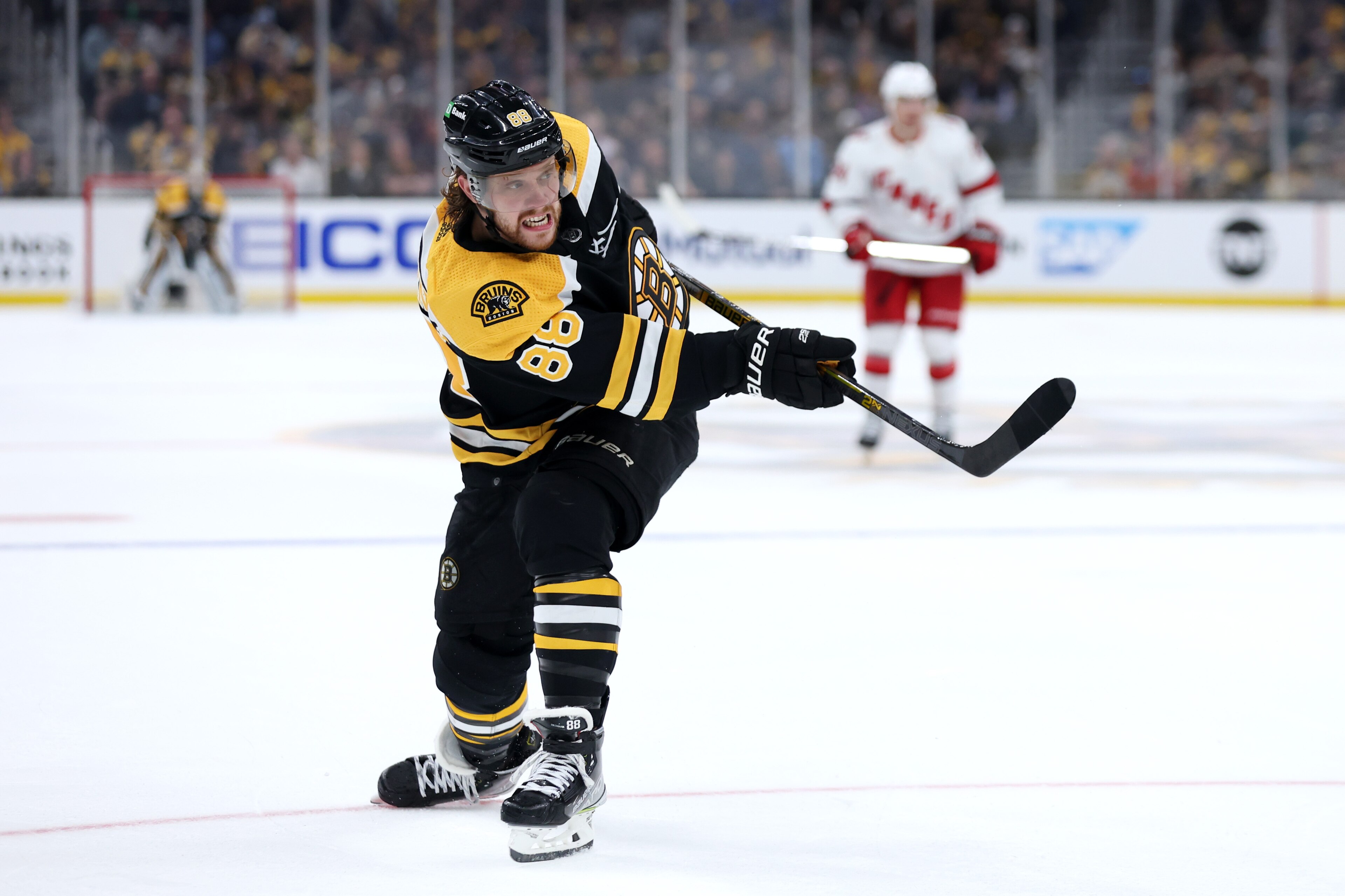 BOSTON, MASSACHUSETTS - MAY 06: David Pastrnak #88 of the Boston Bruins takes a shot against the Carolina Hurricanes during the third period of Game Three of the First Round of the 2022 Stanley Cup Playoffs at TD Garden on May 06, 2022 in Boston, Massachusetts. (Photo by Maddie Meyer/Getty Images) BOSTON, MASSACHUSETTS - MAY 06: David Pastrnak #88 of the Boston Bruins takes a shot against the Carolina Hurricanes during the third period of Game Three of the First Round of the 2022 Stanley Cup Playoffs at TD Garden on May 06, 2022 in Boston, Massachusetts. (Photo by Maddie Meyer/Getty Images)