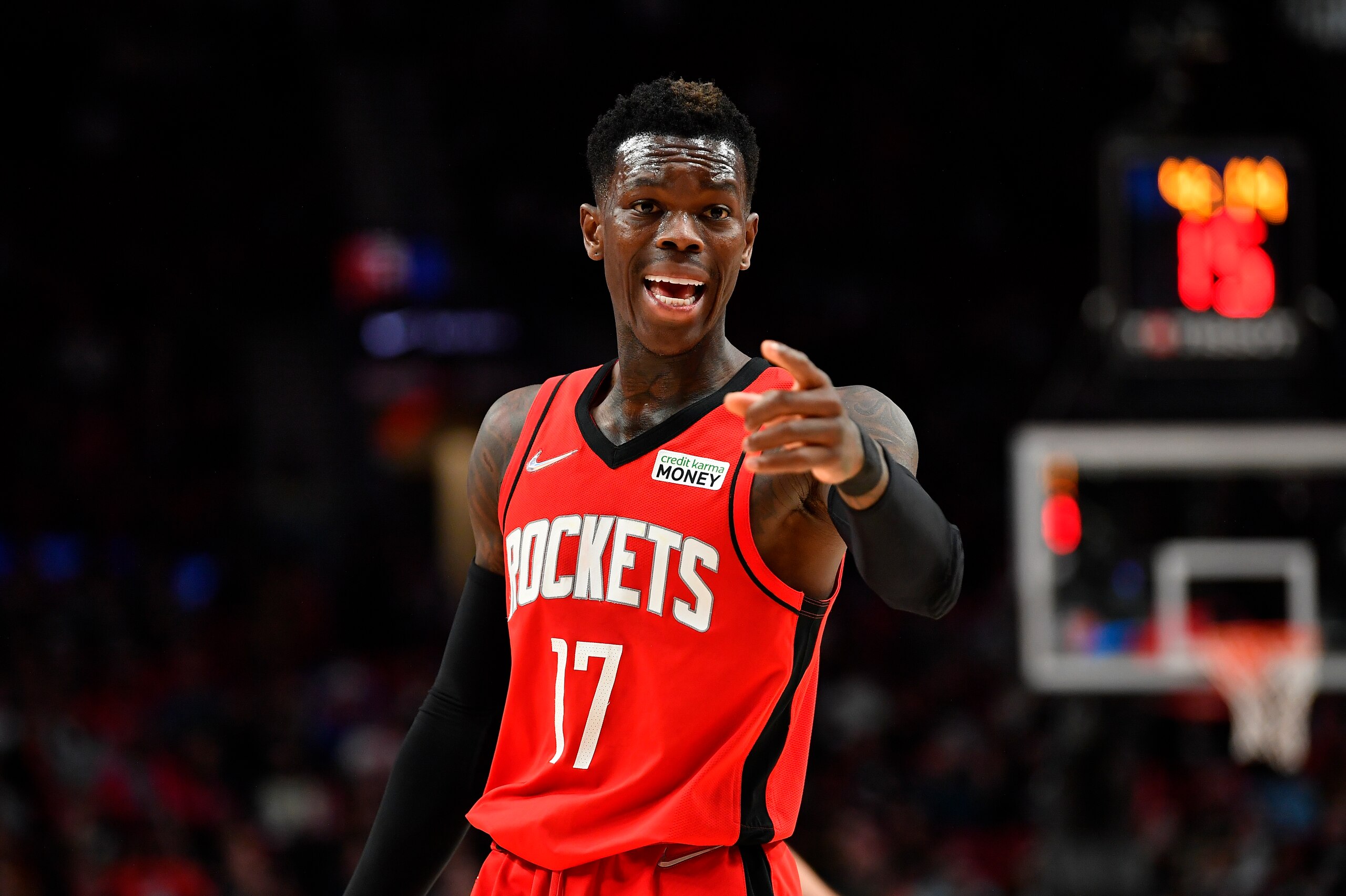 PORTLAND, OREGON - MARCH 26: Dennis Schroder #17 of the Houston Rockets gestures during the fourth quarter against the Portland Trail Blazers at the Moda Center on March 26, 2022 in Portland, Oregon. The Houston Rockets won 115-98. NOTE TO USER: User expressly acknowledges and agrees that, by downloading and or using this photograph, User is consenting to the terms and conditions of the Getty Images License Agreement. (Photo by Alika Jenner/Getty Images)