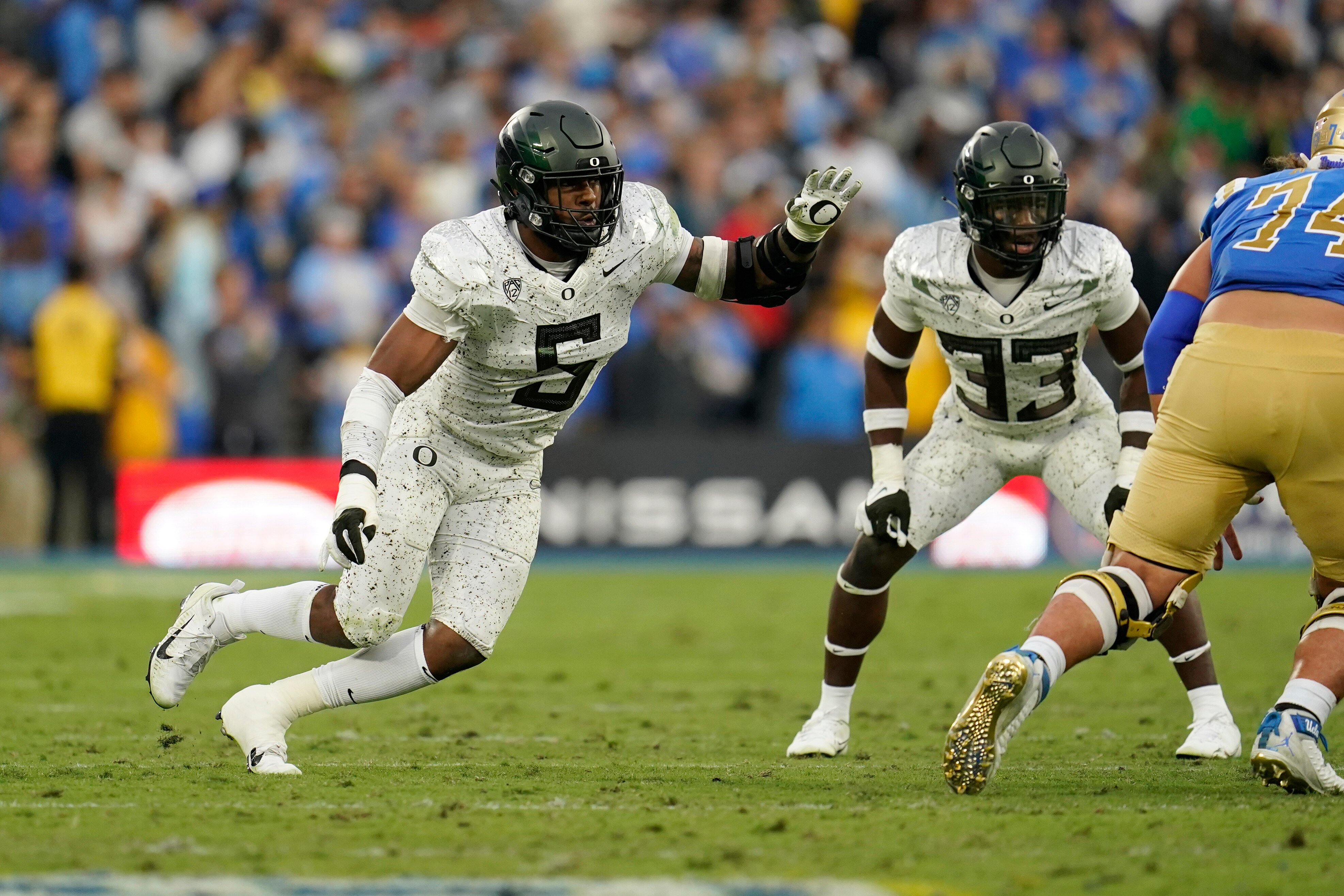 Oregon defensive end Kayvon Thibodeaux (5) defends against UCLA during the second half of an NCAA college football game Saturday, Oct. 23, 2021, in Pasadena, Calif. (AP Photo/Marcio Jose Sanchez)