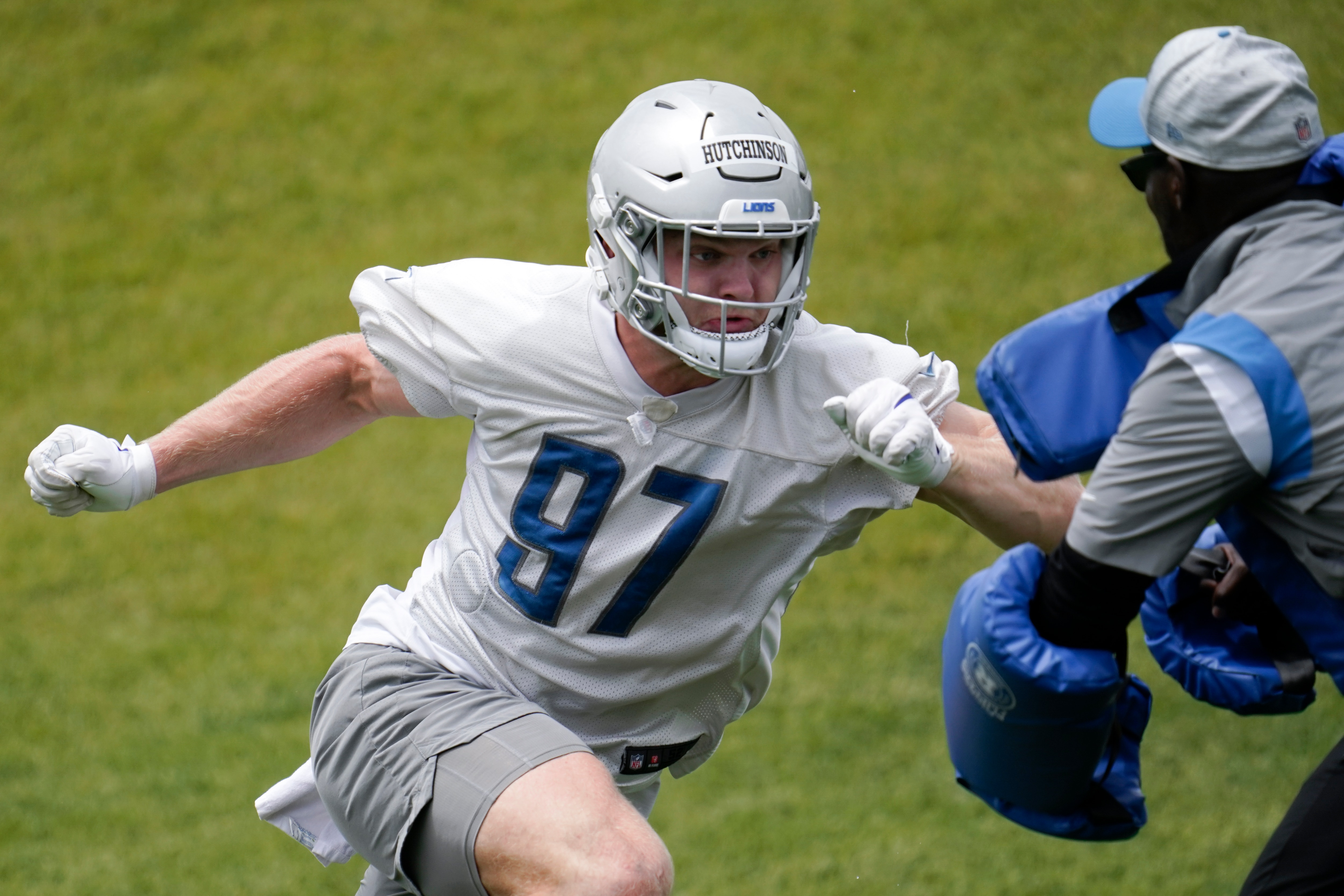 Detroit Lions defensive end Aidan Hutchinson runs a drill during an NFL football practice in Allen Park, Mich., Wednesday, June 8, 2022. (AP Photo/Paul Sancya)