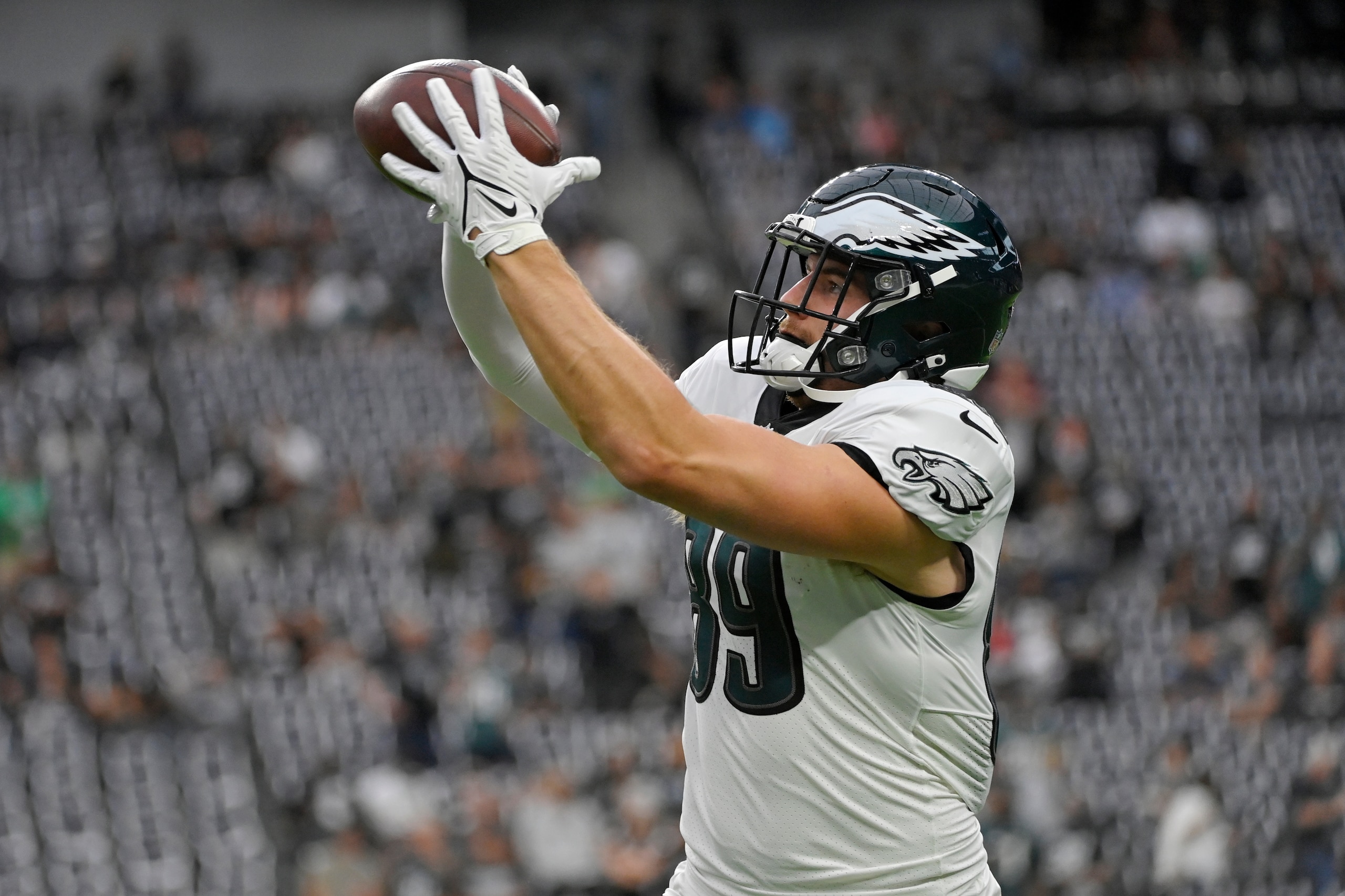 Philadelphia Eagles tight end Jack Stoll (89) warms up before an NFL football game against the Las Vegas Raiders, Sunday, Oct. 24, 2021, in Las Vegas. (AP Photo/David Becker)