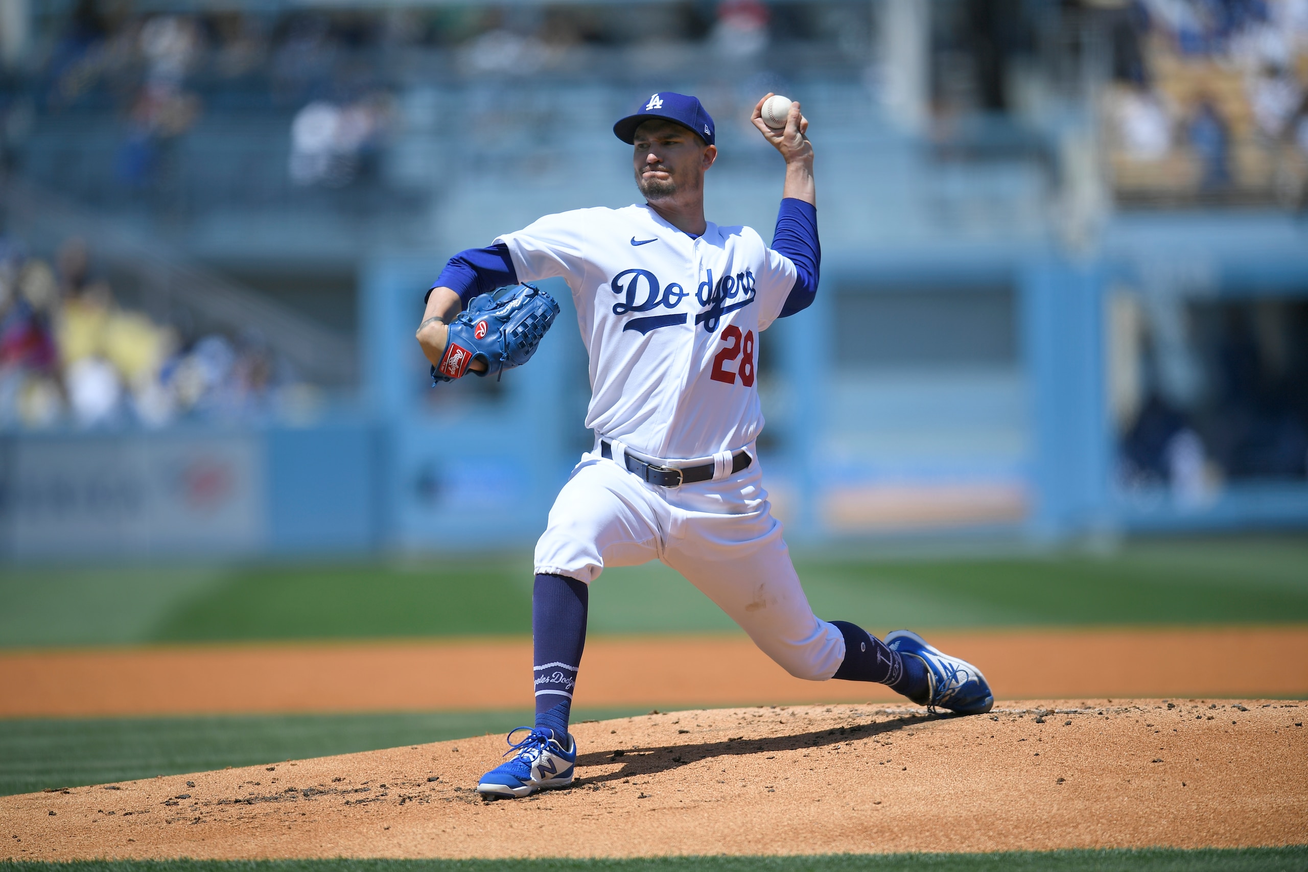 LOS ANGELES, CA - APRIL 17: Andrew Heaney #28 of the Los Angeles Dodgers pitches against the Cincinnati Reds at Dodger Stadium on April 17, 2022 in Los Angeles, California. (Photo by John McCoy/Getty Images)