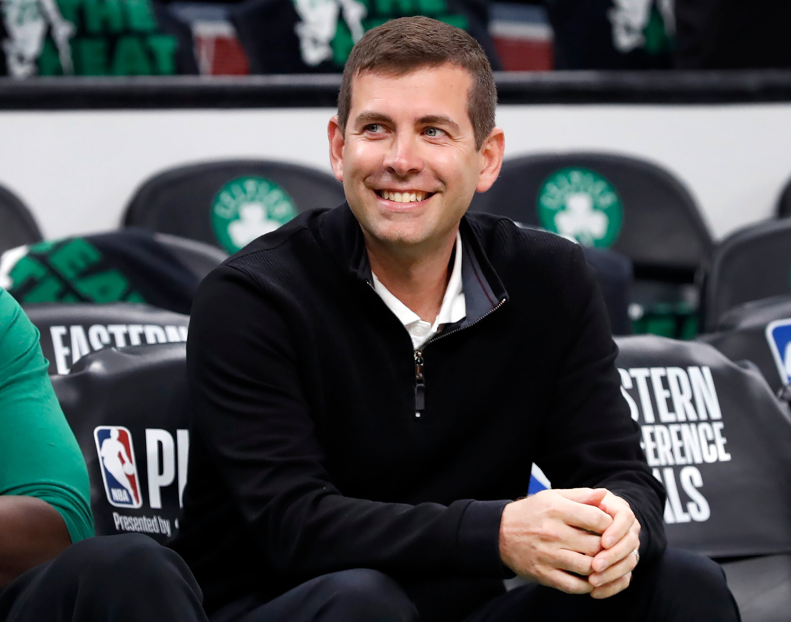 Boston - May 27: Celtics executive Brad Stevens has reasons to smile as his team is one win away from the NBA Finals, he is pictured on the bench before the game. The Boston Celtics host the Miami Heat for Game 6 of the NBA Eastern Conference Finals at TD Garden in Boston, MA on May 27, 2022. (Photo by Jim Davis/The Boston Globe via Getty Images)