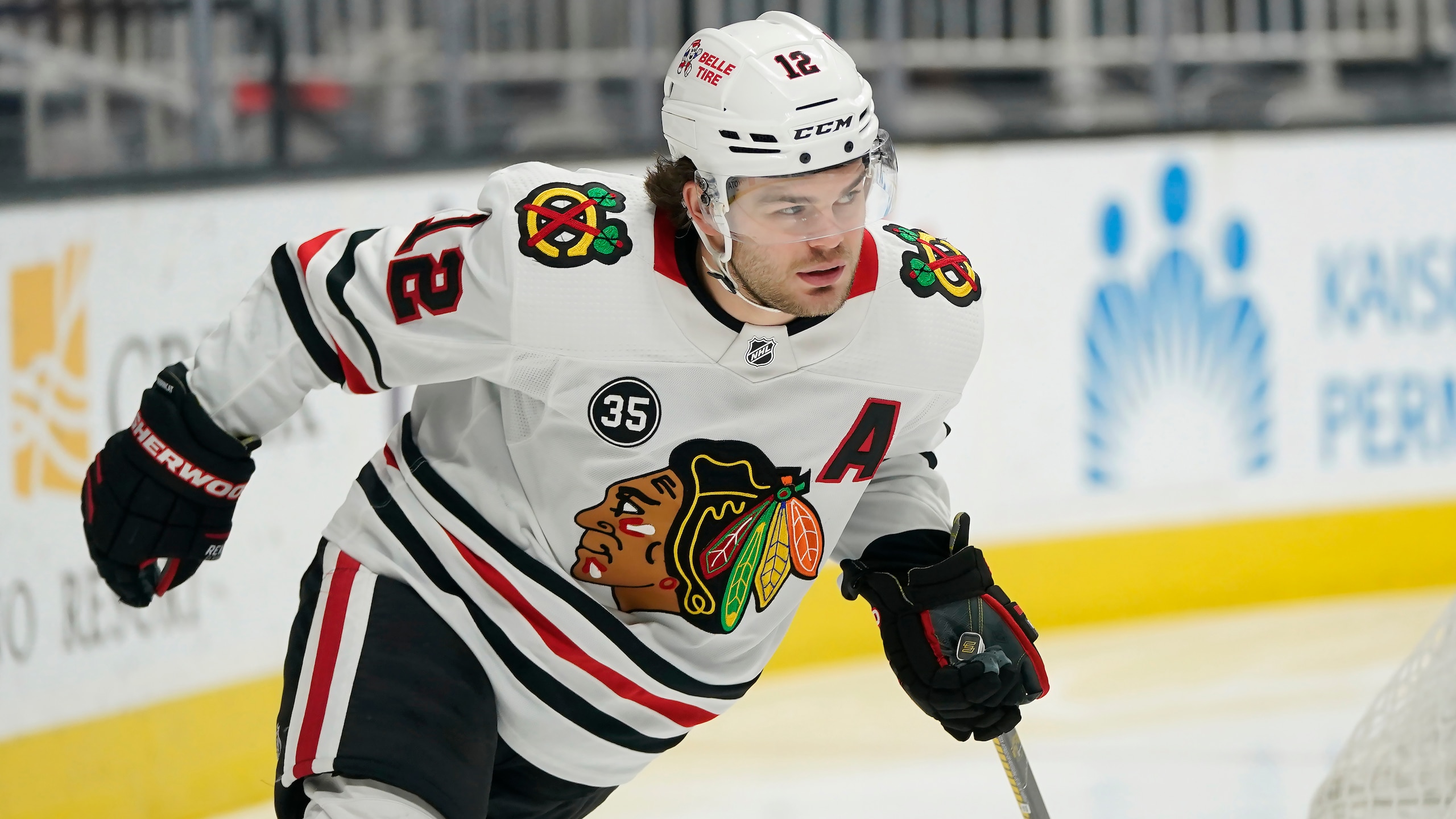 Chicago Blackhawks left wing Alex DeBrincat against the San Jose Sharks during an NHL hockey game in San Jose, Calif., Saturday, April 23, 2022. (AP Photo/Jeff Chiu)
