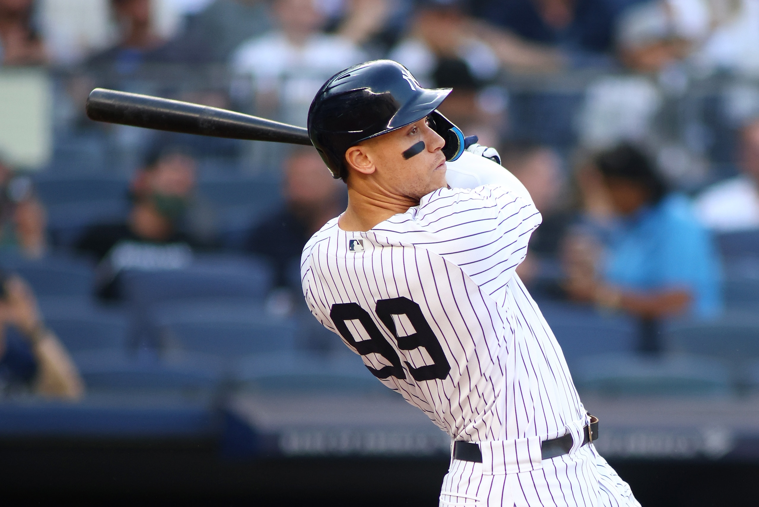 NEW YORK, NEW YORK - JUNE 15: Aaron Judge #99 of the New York Yankees hits a first inning home run against the Tampa Bay Rays at Yankee Stadium on June 15, 2022 in the Bronx borough of New York City. (Photo by Mike Stobe/Getty Images)